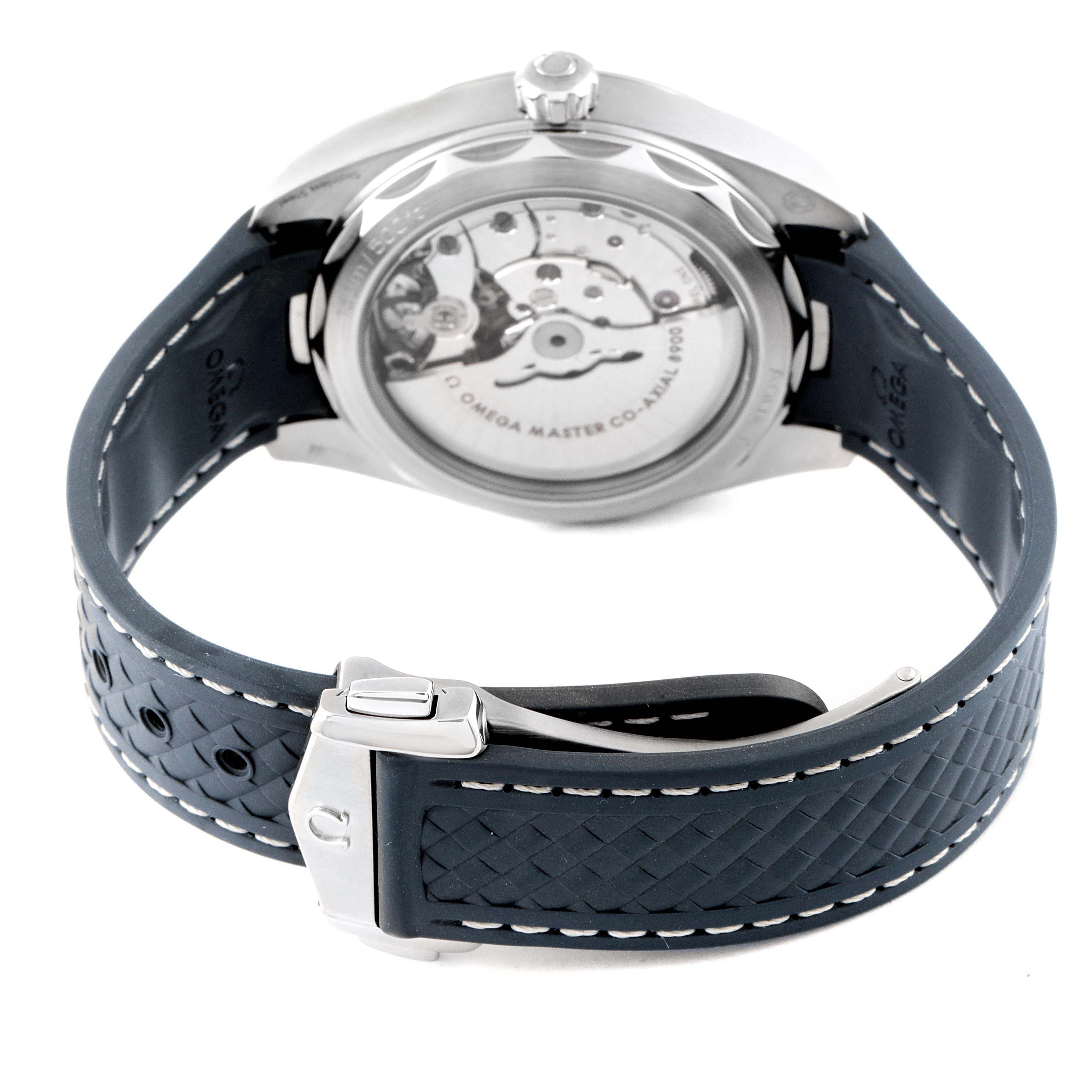 The image shows the back angle of an Omega Aqua Terra 220.12.41.21.03.002 Men
s Stainless Steel Blue Dial 220.12.41.21.03.002 Men
s Stainless Steel Blue Dial watch, highlighting its automatic movement and rubber strap.