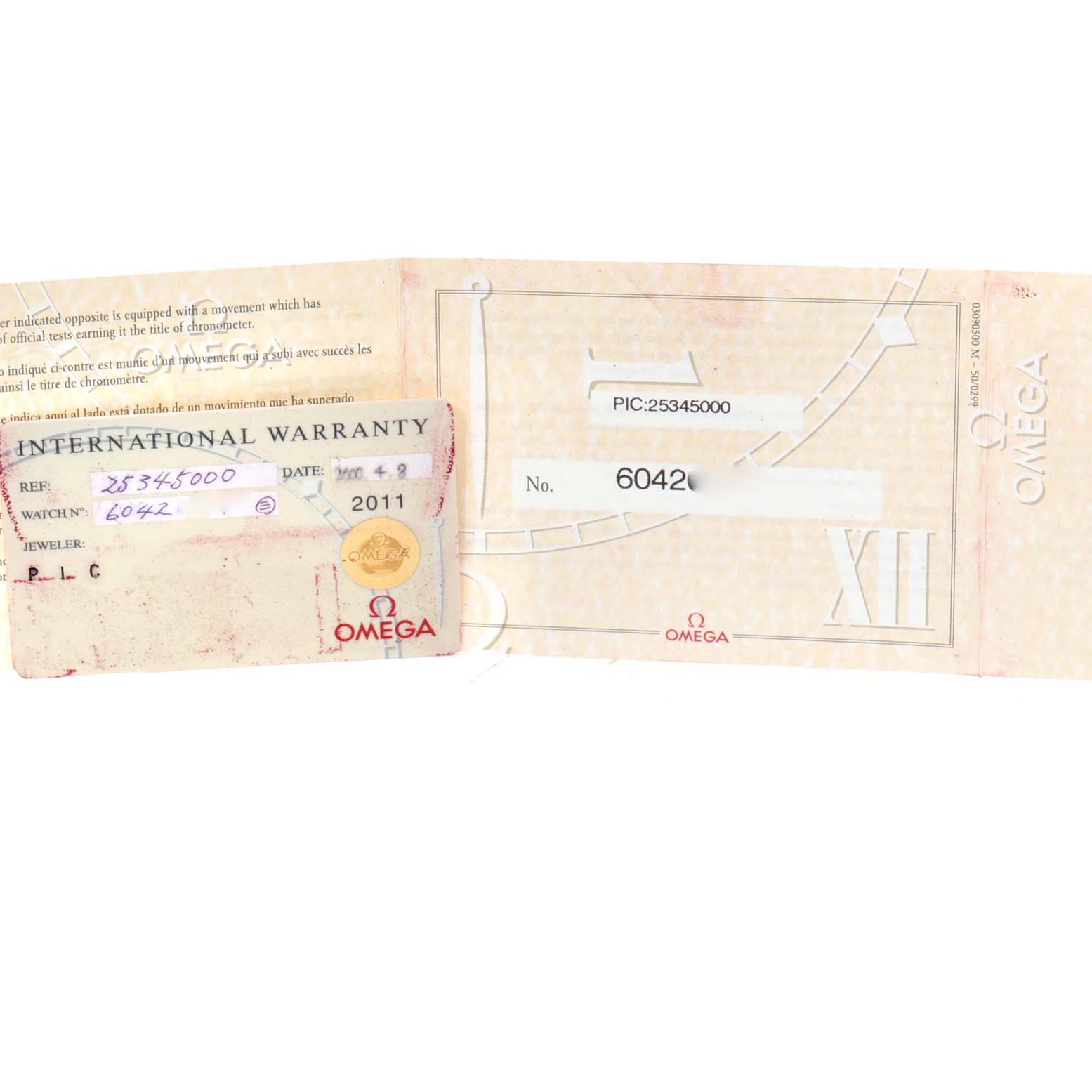 The image shows the international warranty card and paperwork for an Omega Seamaster 2534.50.00 Men's Stainless Steel Black Dial 2534.50.00 Men's Stainless Steel Black Dial watch.