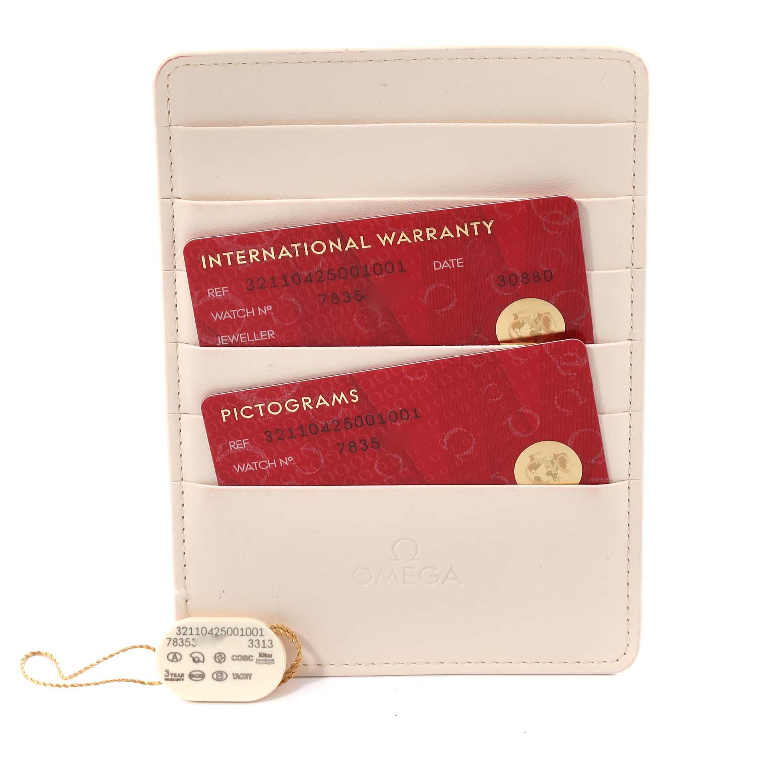 The image shows an Omega Speedmaster 321.10.42.50.01.001 Men
s Stainless Steel Black Dial 321.10.42.50.01.001 Men
s Stainless Steel Black Dial
s warranty card holder, including international warranty and pictogram cards, along with a hang tag.