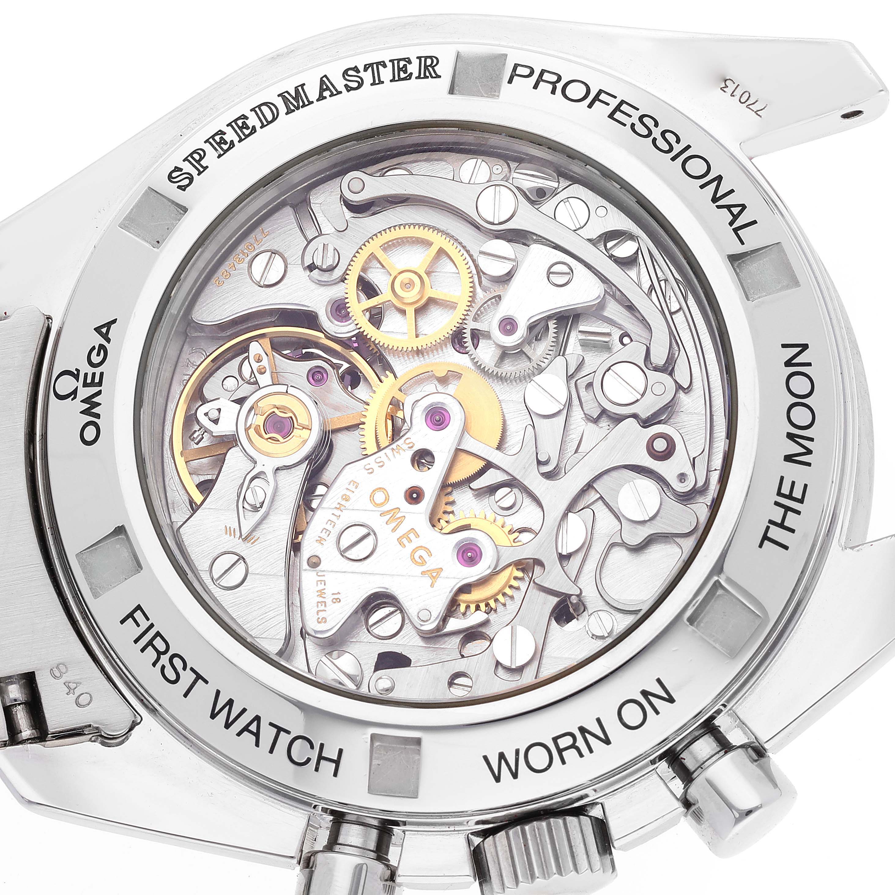 The image shows the case back of an Omega Speedmaster 3572.50.00 Men's Stainless Steel Black Dial 3572.50.00 Men's Stainless Steel Black Dial watch, revealing its intricate mechanical movement.