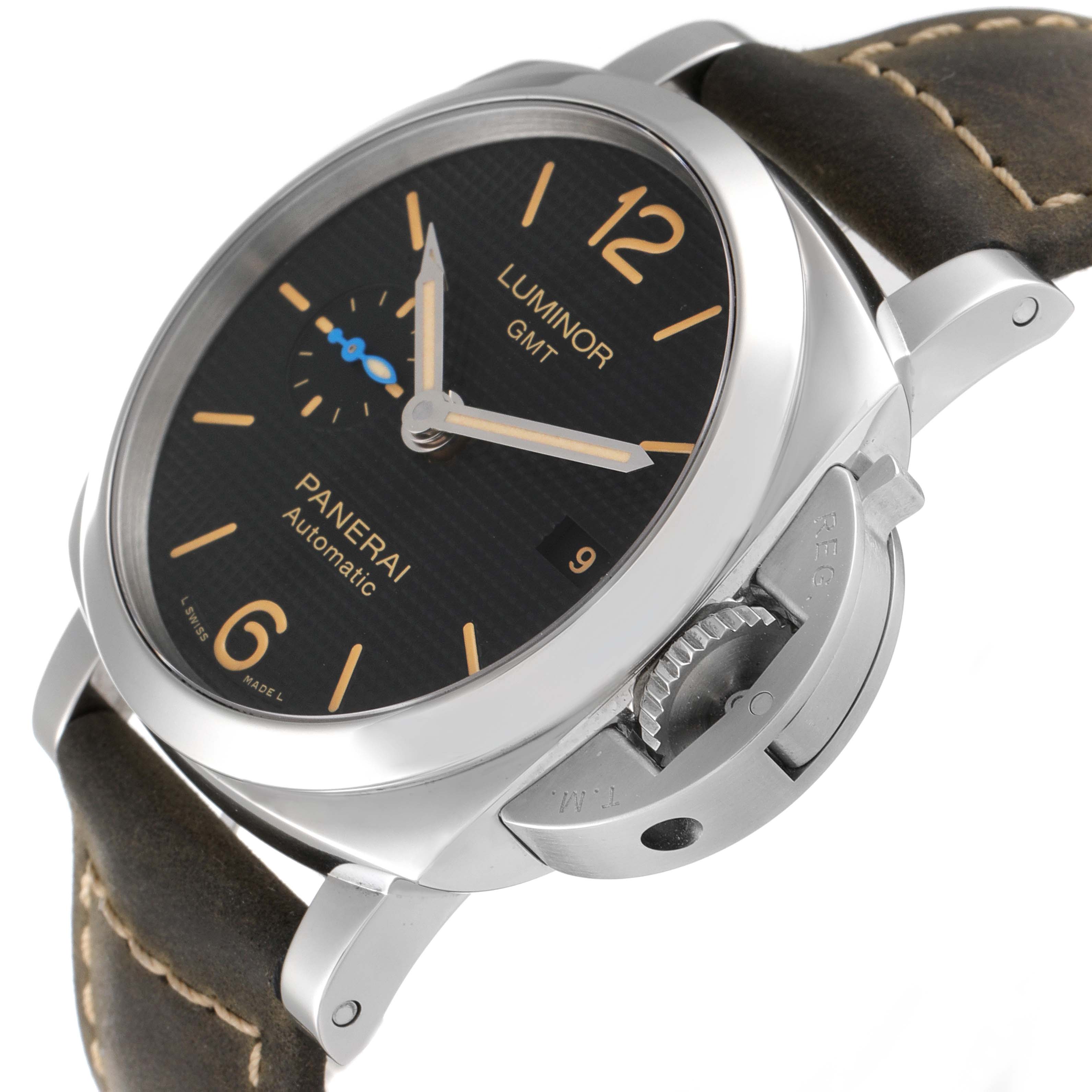 This image shows a close-up of a Panerai Luminor PAM01535 Men
s Stainless Steel Black Dial PAM01535 Men
s Stainless Steel Black Dial GMT watch face, crown, and leather strap from an angled side view.
