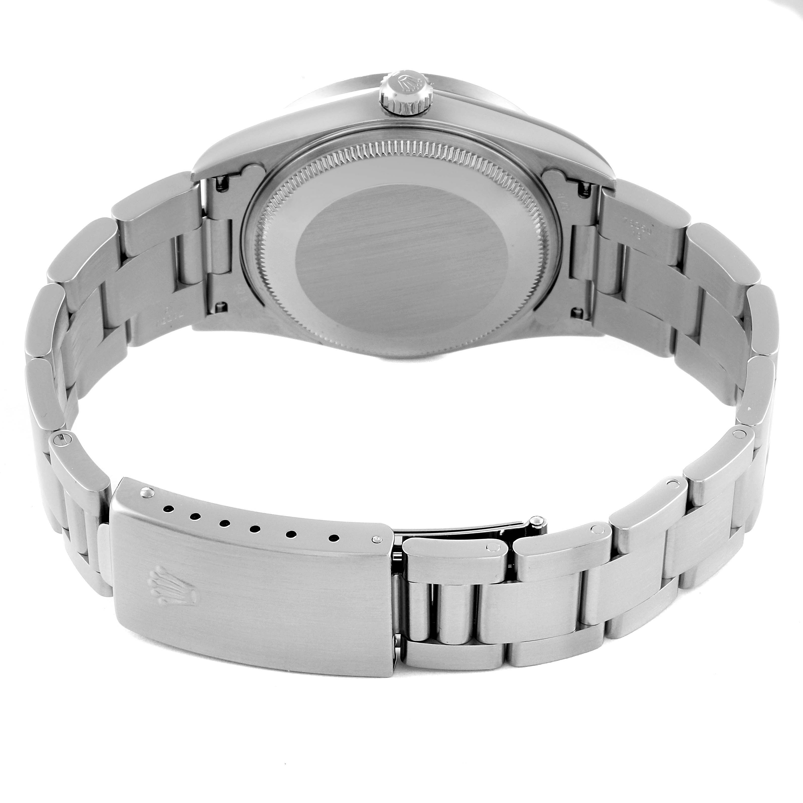 This image shows the back and band of a Rolex Air-King 14010M Men's Stainless Steel White Dial 14010M Men's Stainless Steel White Dial watch, displaying the clasp and caseback.