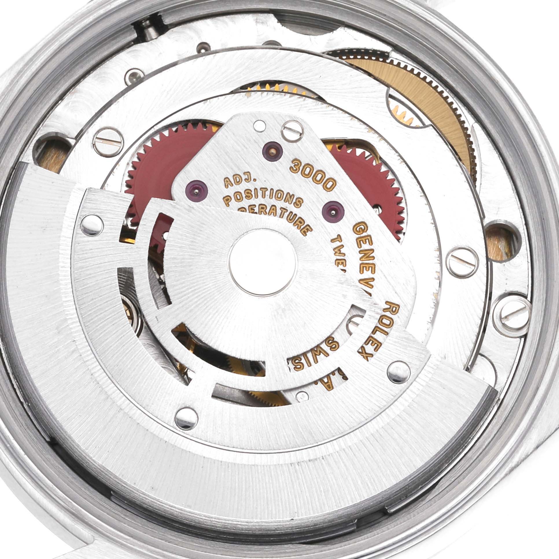 This is a close-up view of the internal mechanism of the Rolex Air-King 14010 Men's Stainless Steel Blue Dial 14010 Men's Stainless Steel Blue Dial watch model, showing gears and the rotor.