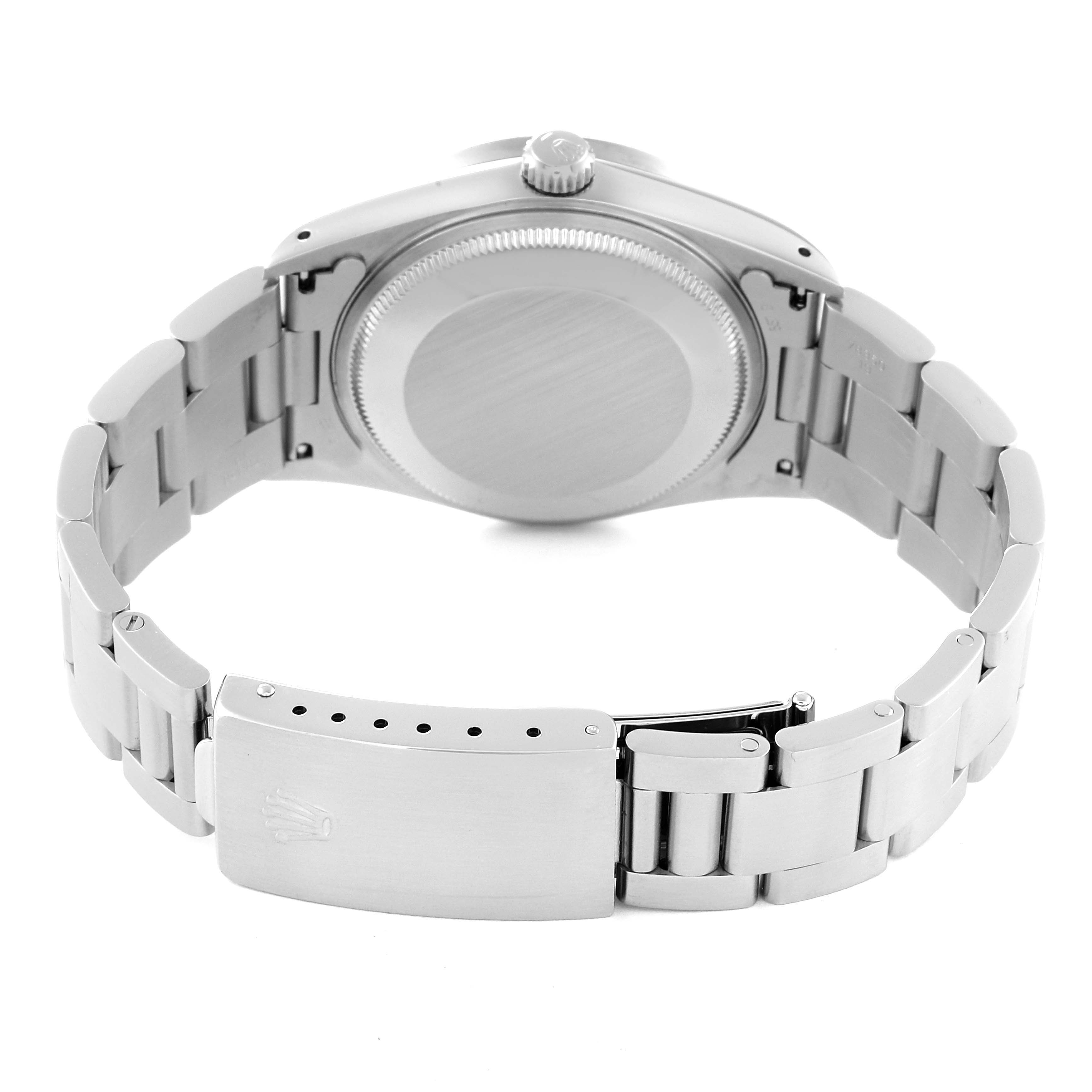 This image shows the back view of a Rolex Air-King 14010 Men's Stainless Steel Blue Dial 14010 Men's Stainless Steel Blue Dial watch, highlighting its bracelet, clasp, and case back.