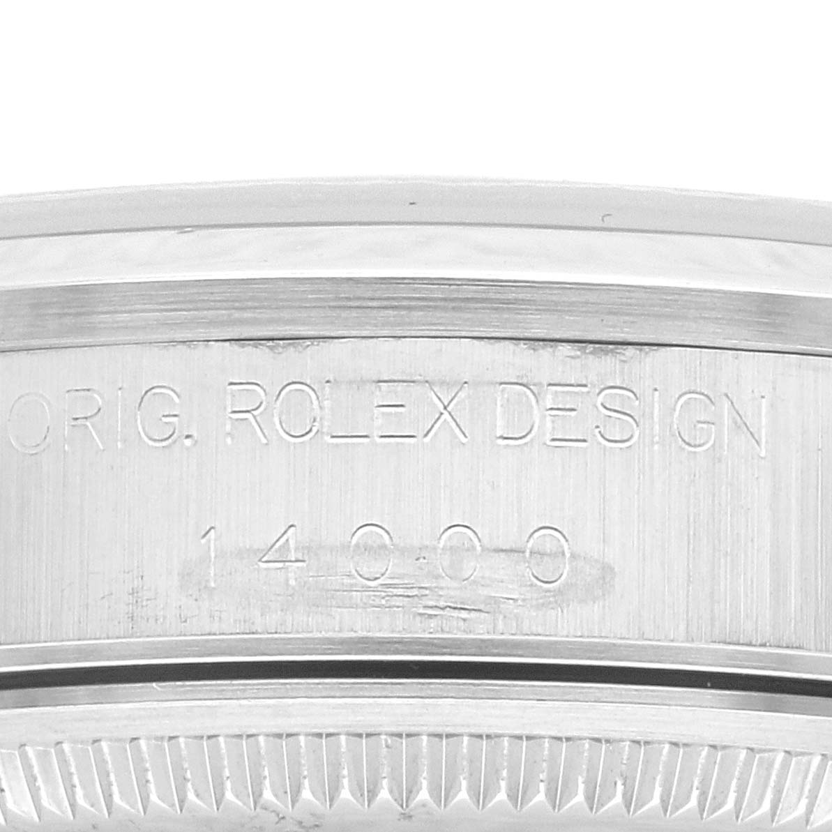 The image shows a close-up view of the case back edge of a Rolex Air-King 14000 Men's Stainless Steel Pink Dial 14000 Men's Stainless Steel Pink Dial watch, highlighting the "ORIG. ROLEX DESIGN" text and model number.