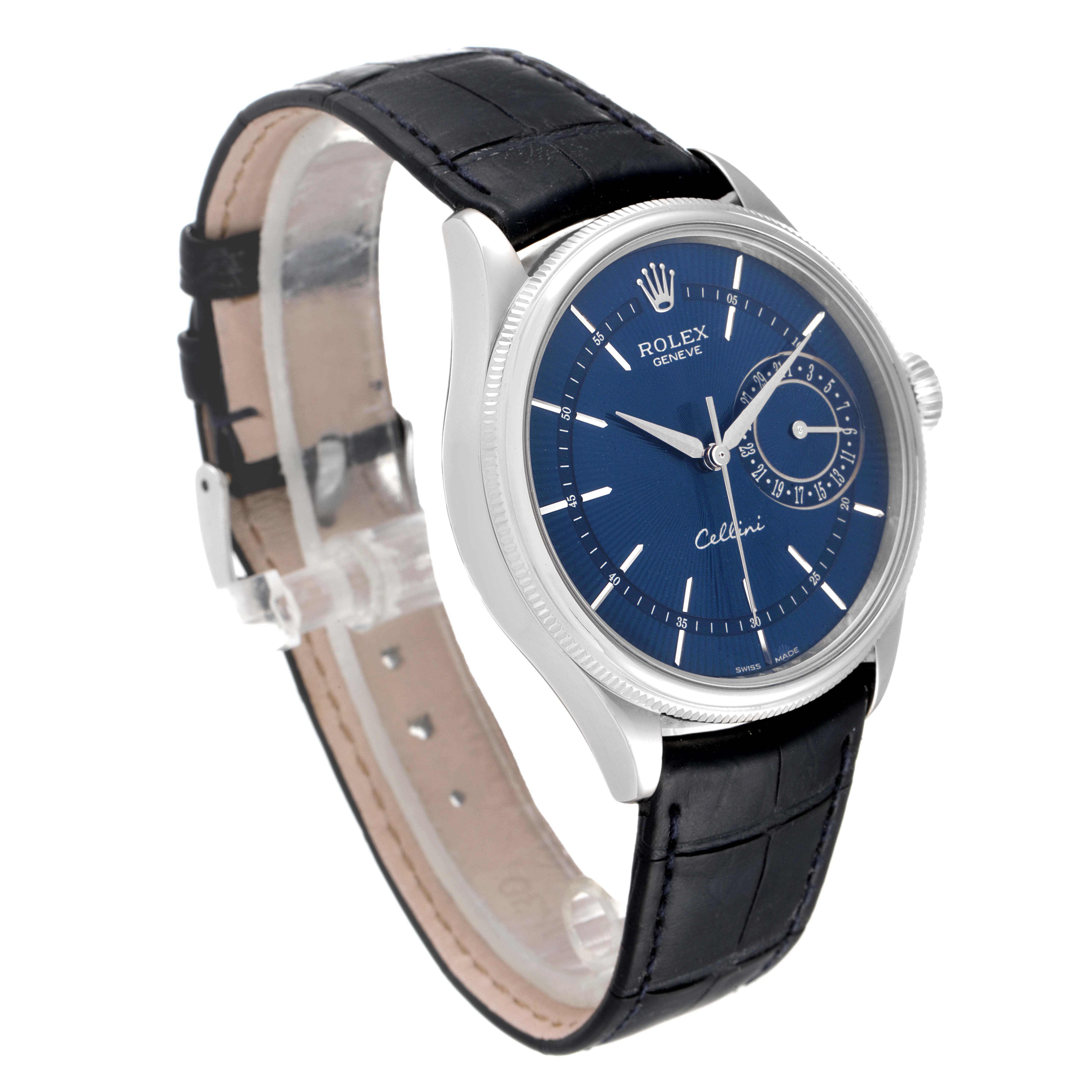The Rolex Cellini 50519 Men's White Gold Blue Dial 50519 Men's White Gold Blue Dial watch is shown at a three-quarter angle, displaying the blue dial, silver markers, case, crown, and leather strap.