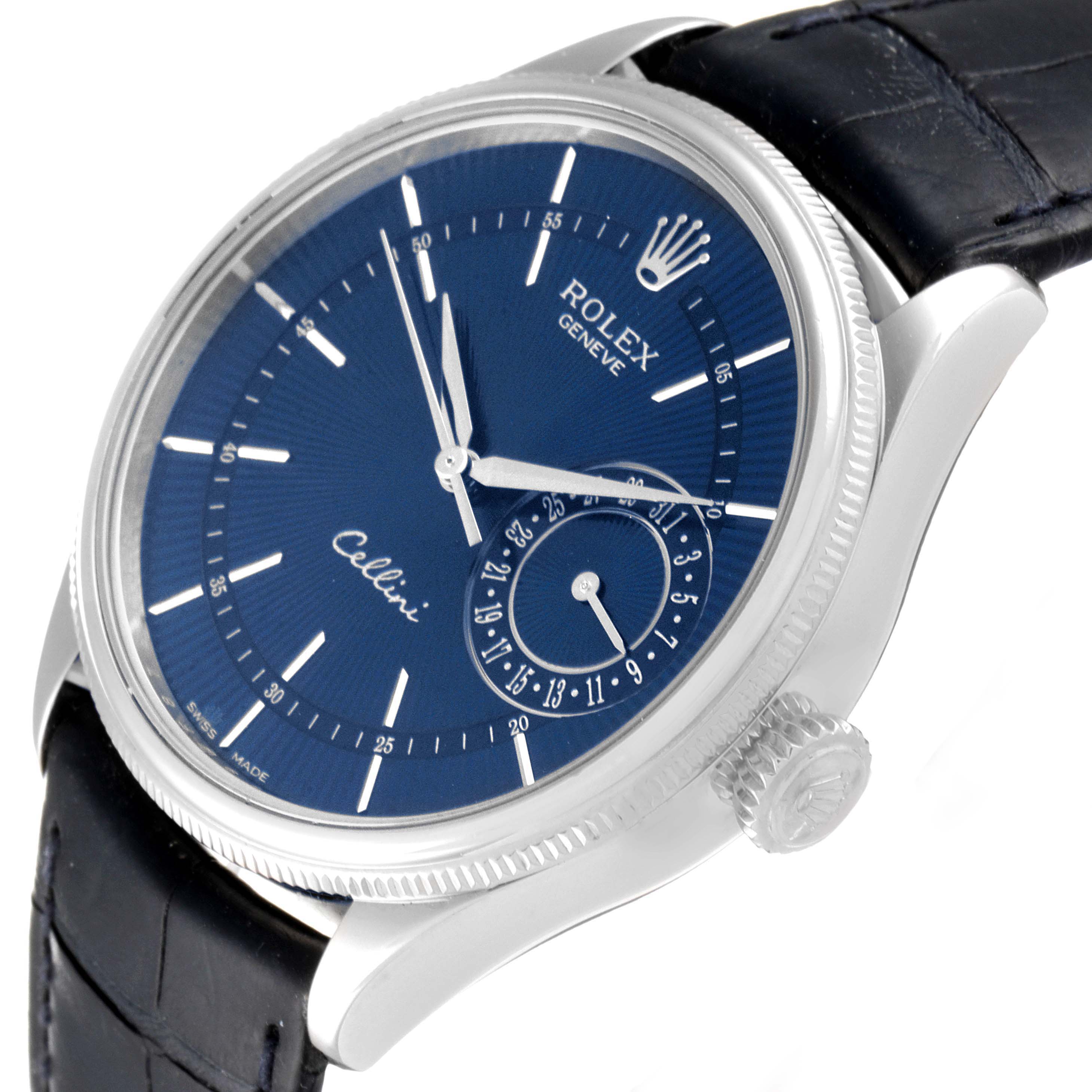 This image shows a Rolex Cellini 50519 Men's White Gold Blue Dial 50519 Men's White Gold Blue Dial watch from a side angle, highlighting its blue dial, crown, and black leather strap.
