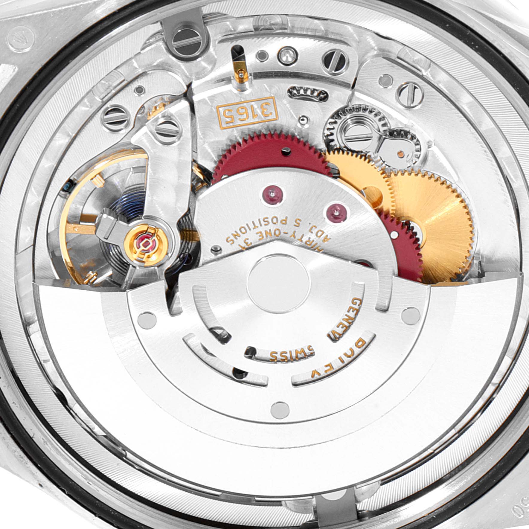 The image shows an angled view of the inner mechanical movement of a Rolex Cellini 50519 Men's White Gold Blue Dial 50519 Men's White Gold Blue Dial watch, highlighting gears and components.