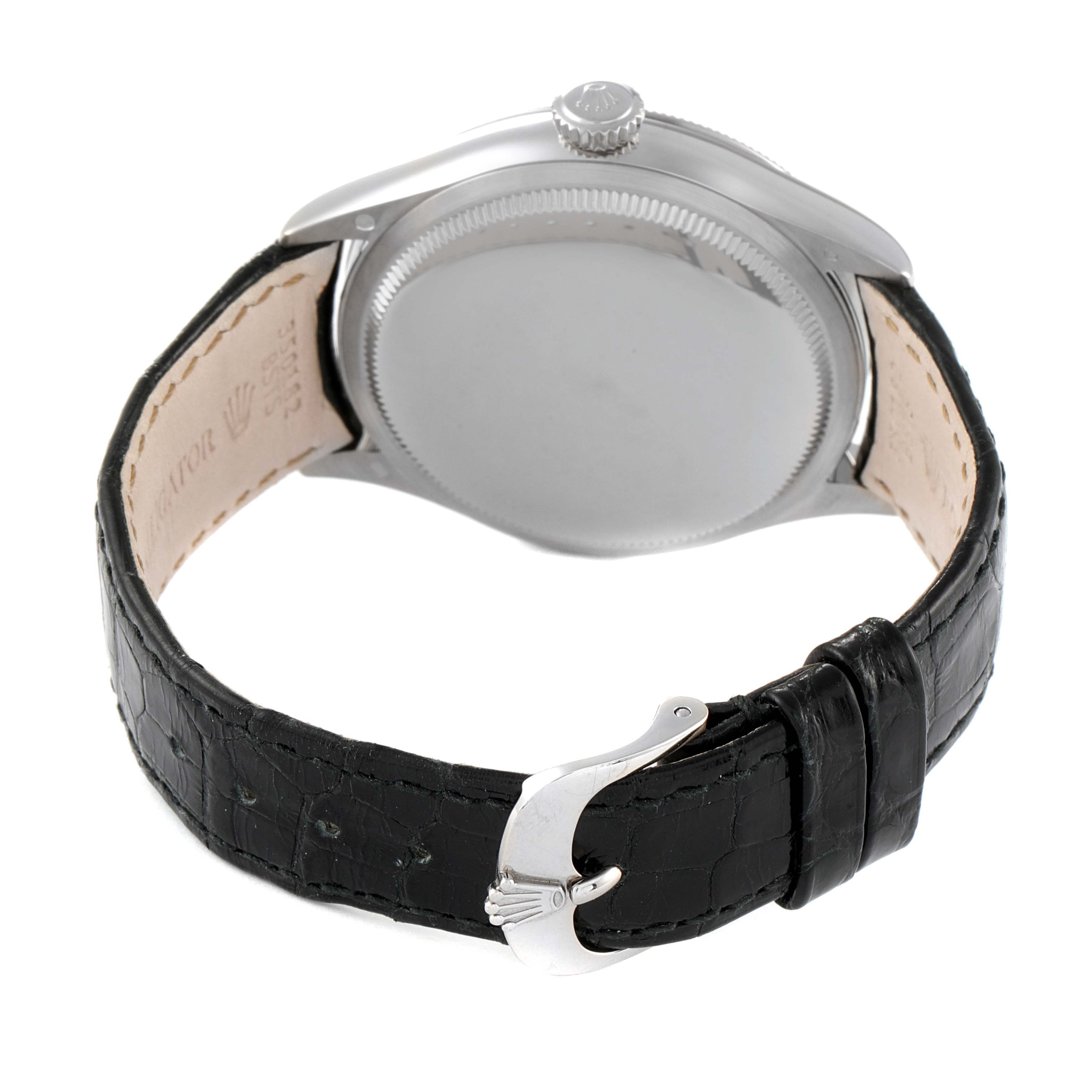 The Rolex Cellini 50509 Men's Stainless Steel White Dial 50509 Men's Stainless Steel White Dial watch is shown from the back angle, highlighting the case back, crown, and leather strap with a buckle.