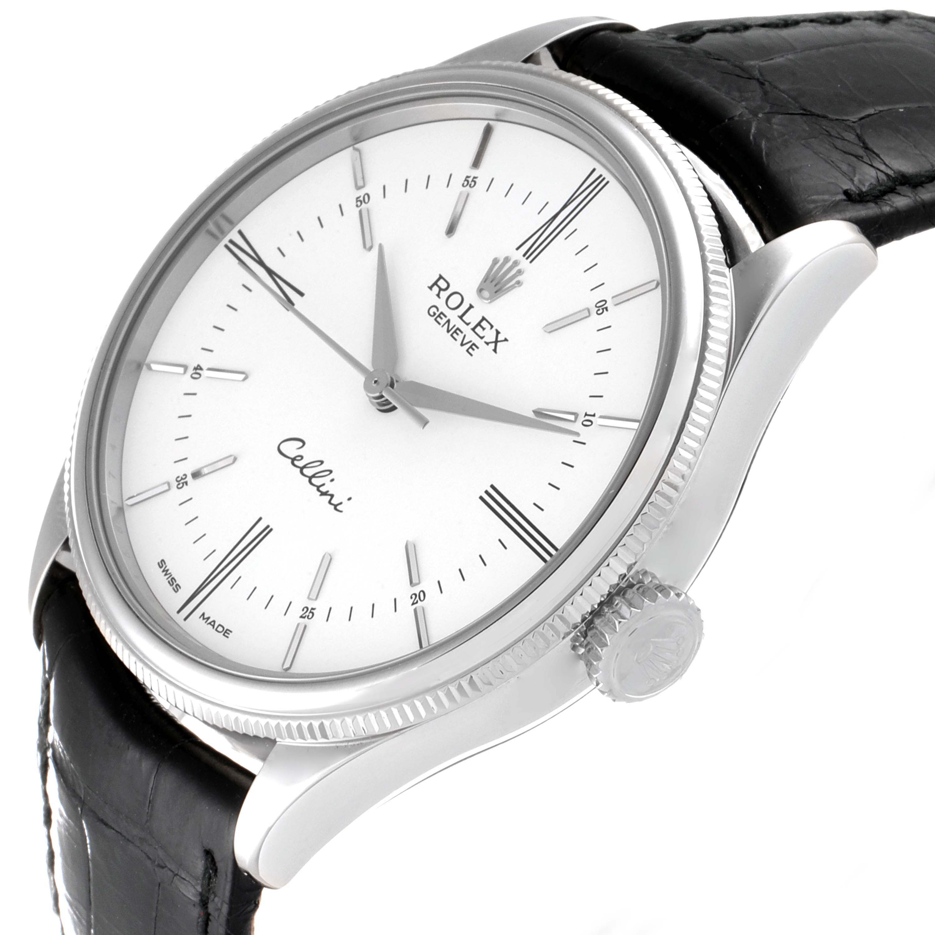 This image shows a side view of the Rolex Cellini 50509 Men's Stainless Steel White Dial 50509 Men's Stainless Steel White Dial watch displaying its white dial, silver hands, crown, and black leather strap.