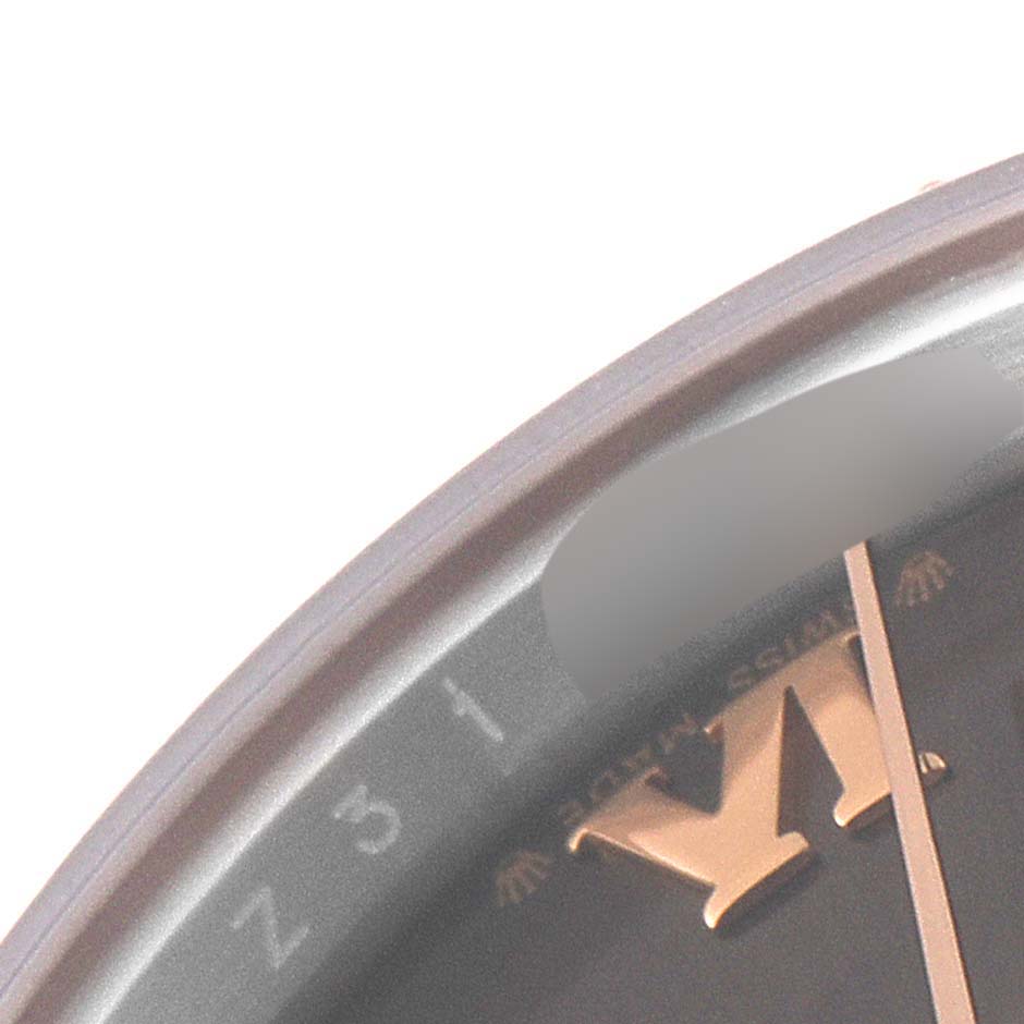 The image shows a close-up of the dial, bezel, and minute hand of a Rolex Datejust 279171 Women's Steel and Gold (two tone) Brown Dial 279171 Women's Steel and Gold (two tone) Brown Dial watch, highlighting the hour marker "V."