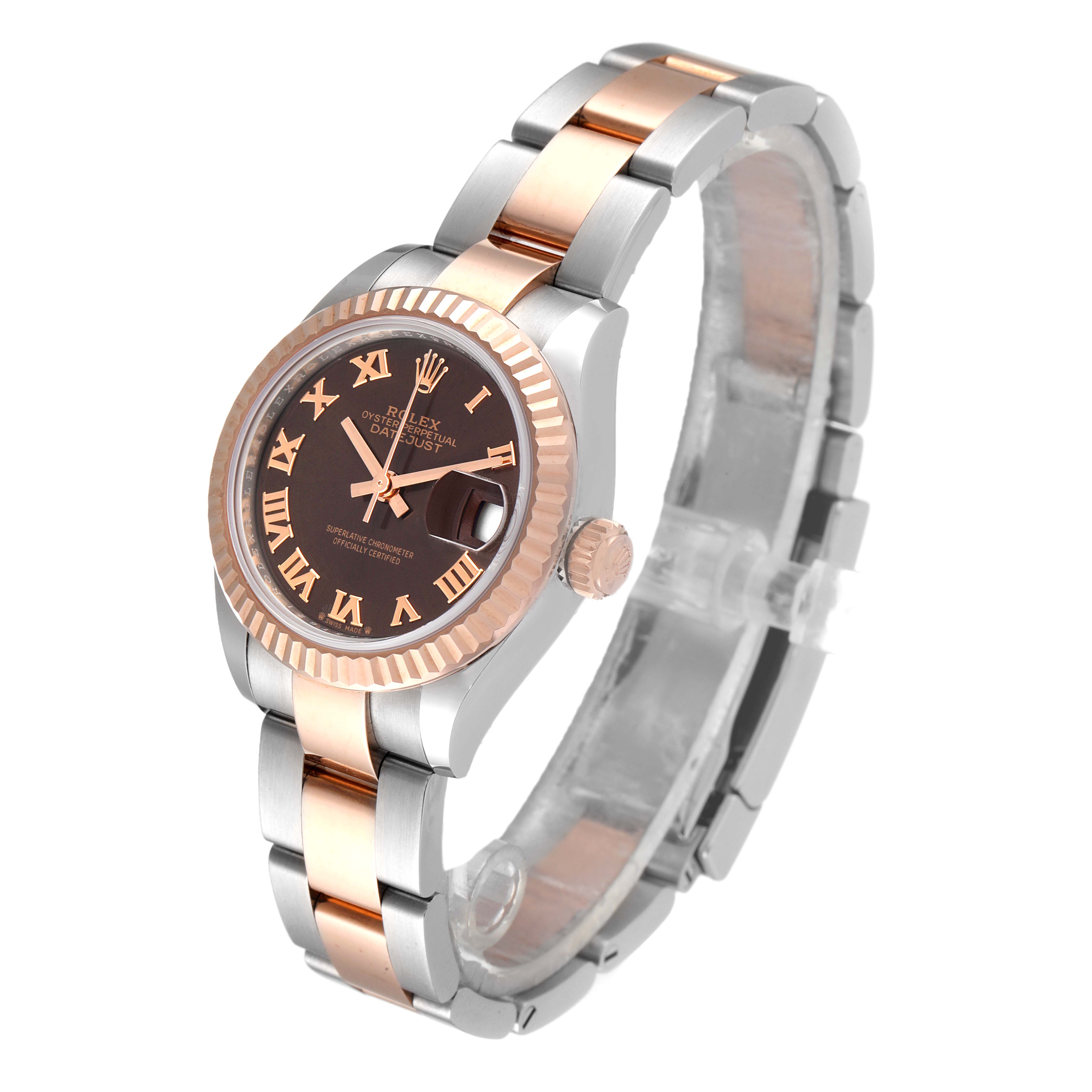 The Rolex Datejust 279171 Women's Steel and Gold (two tone) Brown Dial 279171 Women's Steel and Gold (two tone) Brown Dial watch is shown at a three-quarter angle, highlighting its bracelet, dial, and crown.