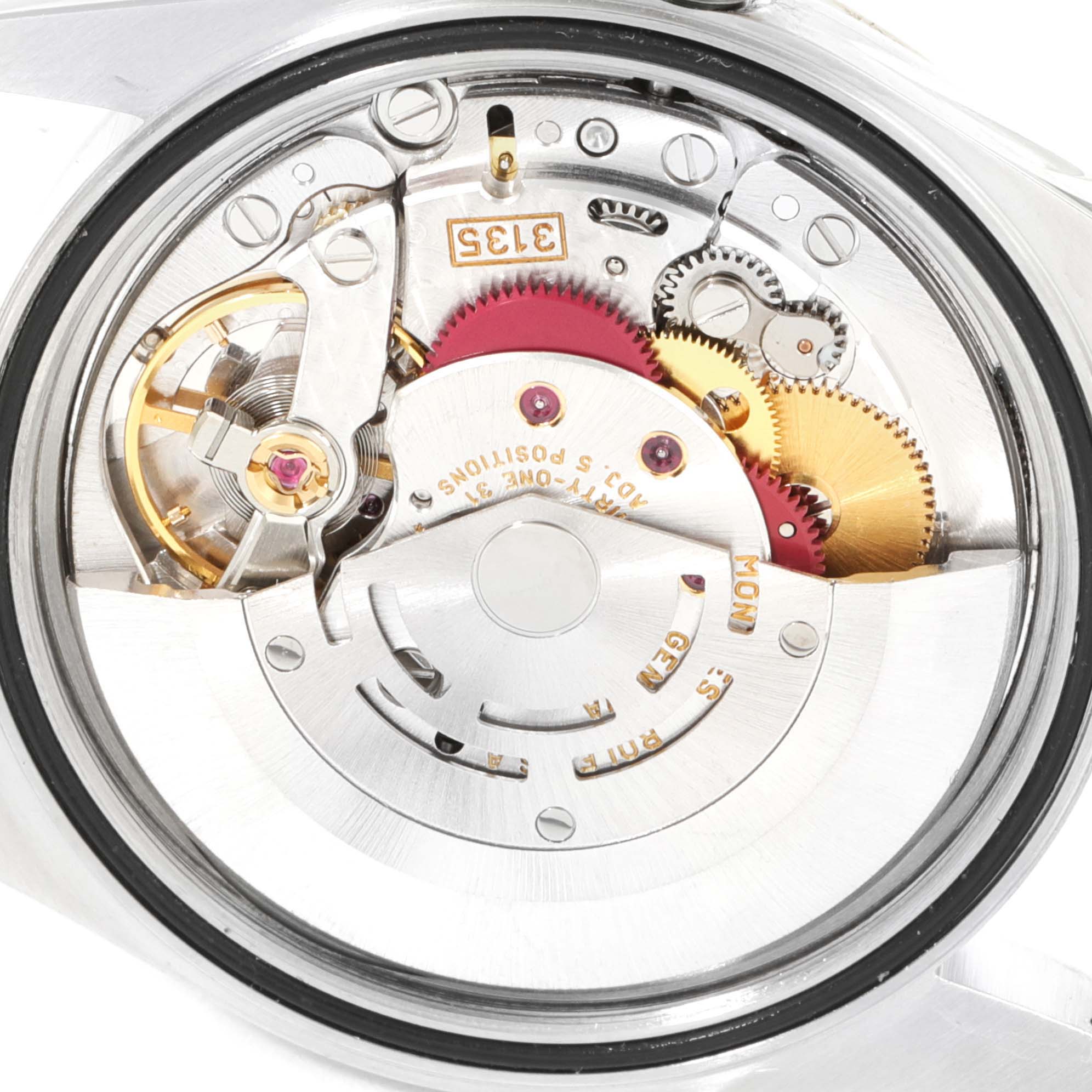 This is a close-up view of the internal mechanical movement of the Rolex Datejust 16203 Men
s Steel and Gold (two tone) Grey Dial 16203 Men
s Steel and Gold (two tone) Grey Dial watch.