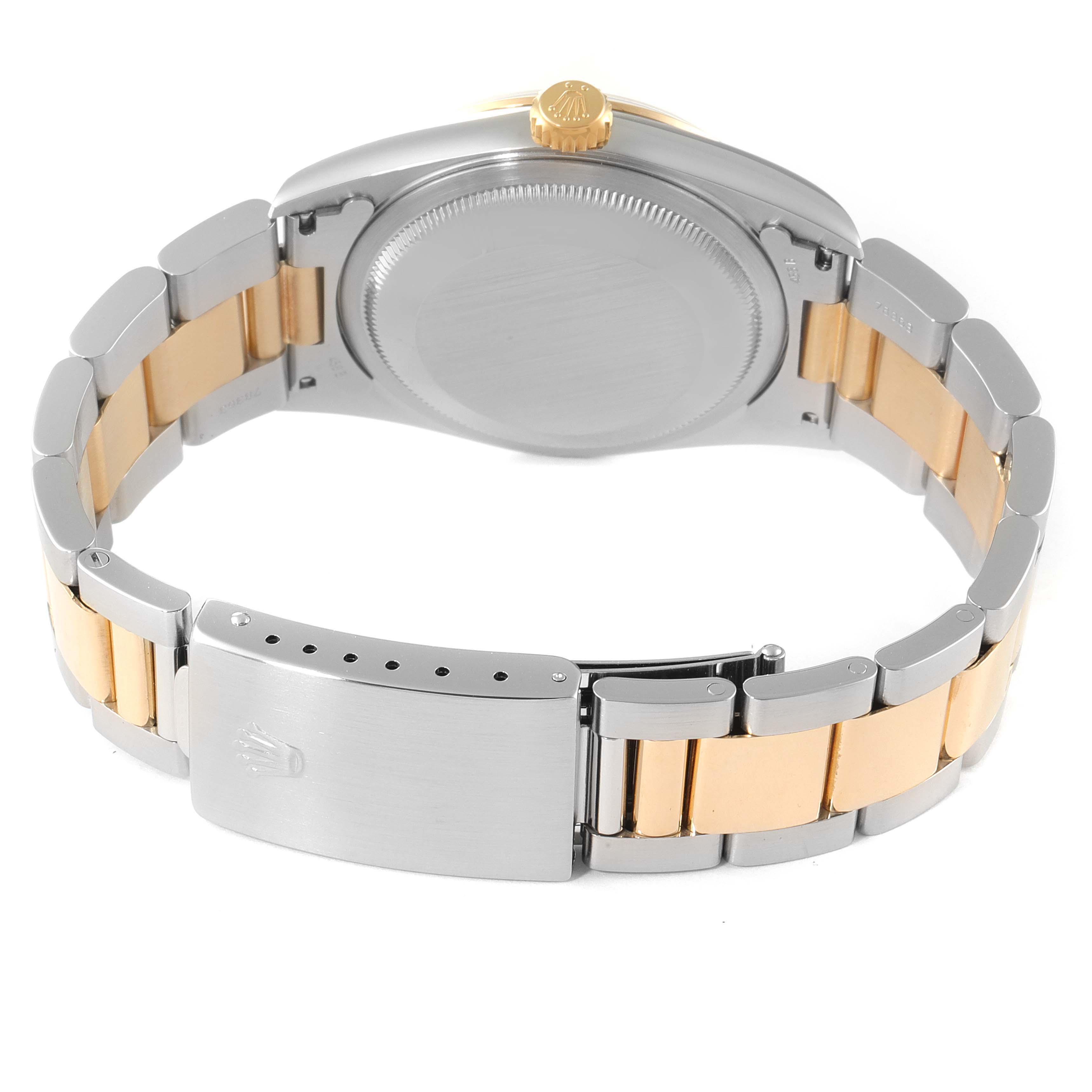 The image depicts the back view of a Rolex Datejust 16203 Men
s Steel and Gold (two tone) Grey Dial 16203 Men
s Steel and Gold (two tone) Grey Dial watch, highlighting its dual-tone bracelet and the clasp.