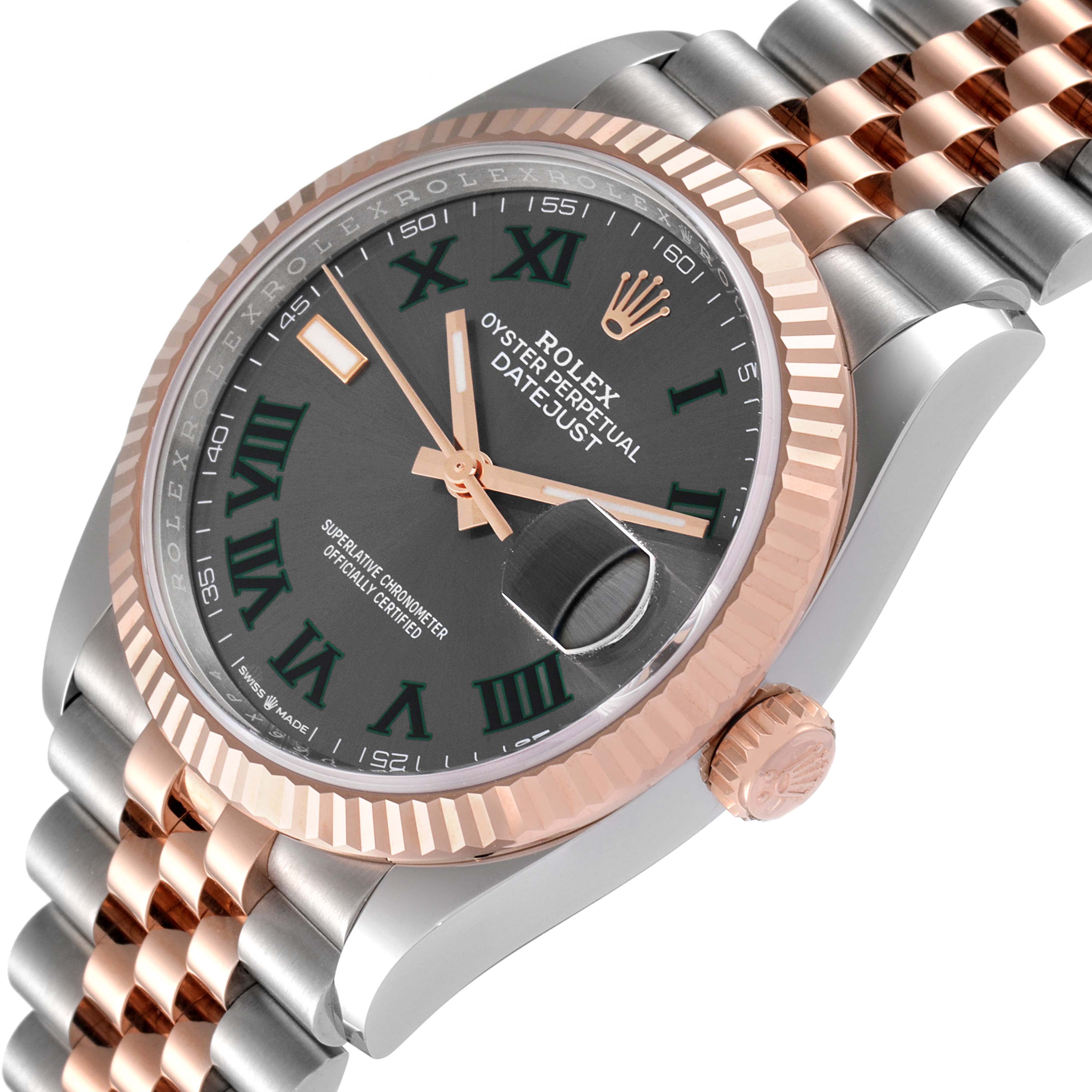 This image shows a side angle of the Rolex Datejust 126231 Men's Steel and Gold (two tone) Grey Dial 126231 Men's Steel and Gold (two tone) Grey Dial, highlighting its dial, bezel, and partially its bracelet.