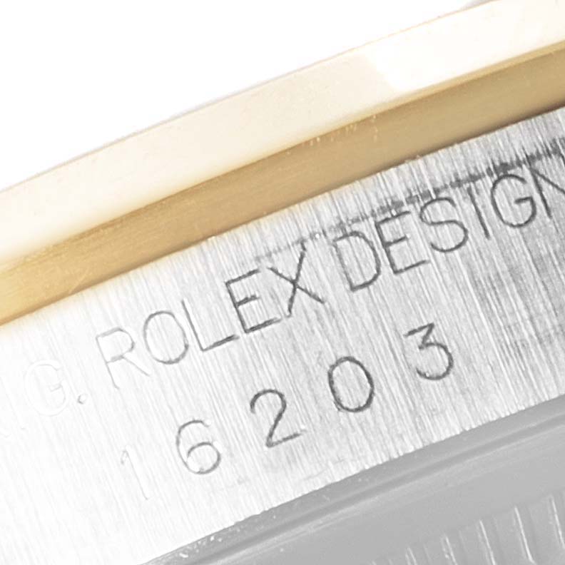 This image shows a close-up of the case reference number "16203" on a Rolex Datejust 16203 Men's Steel and Gold (two tone) Grey Dial 16203 Men's Steel and Gold (two tone) Grey Dial watch.