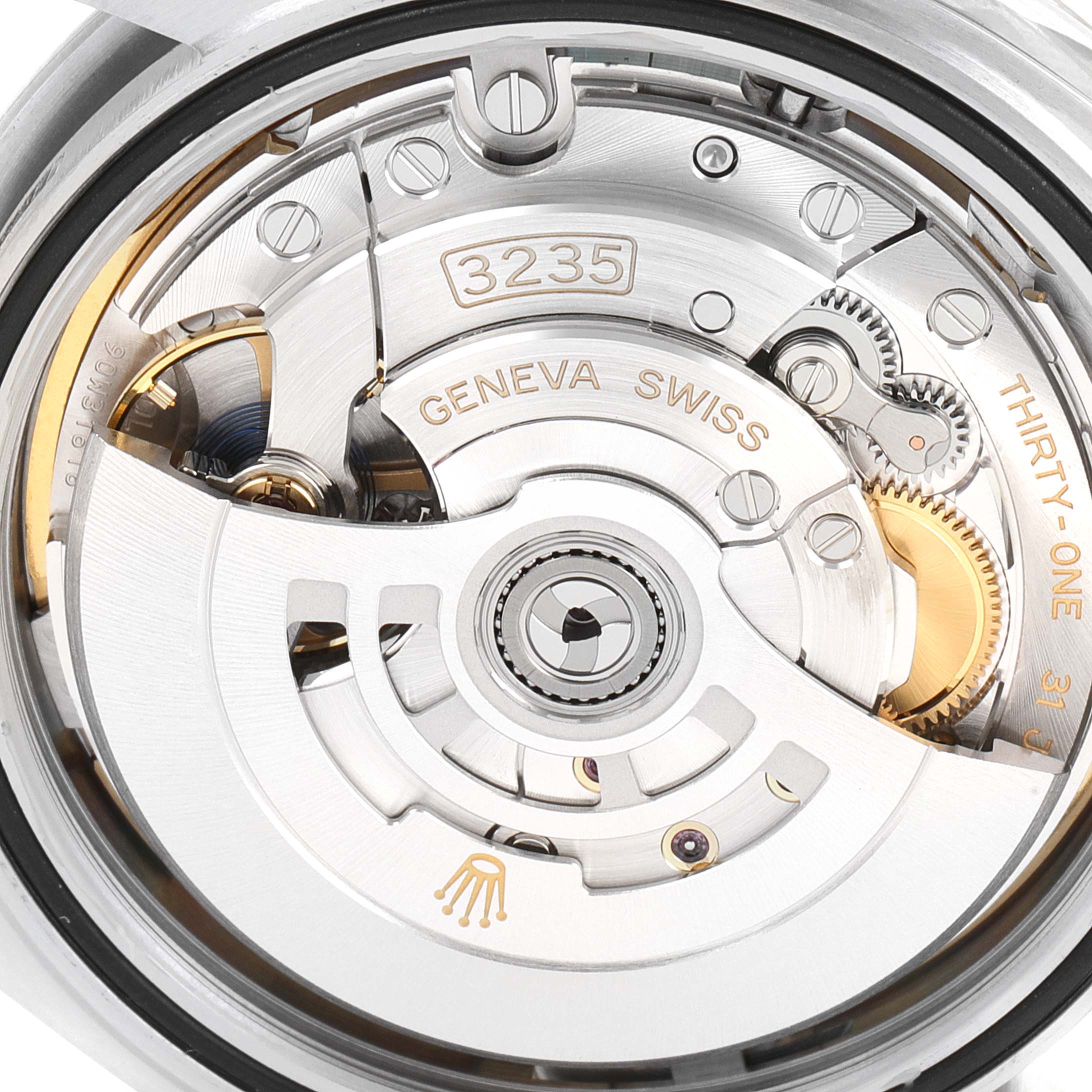 The image shows the movement mechanism of the Rolex Datejust 41 126300 Men
s Stainless Steel Blue Dial 126300 Men
s Stainless Steel Blue Dial watch from a close-up, rear view angle.