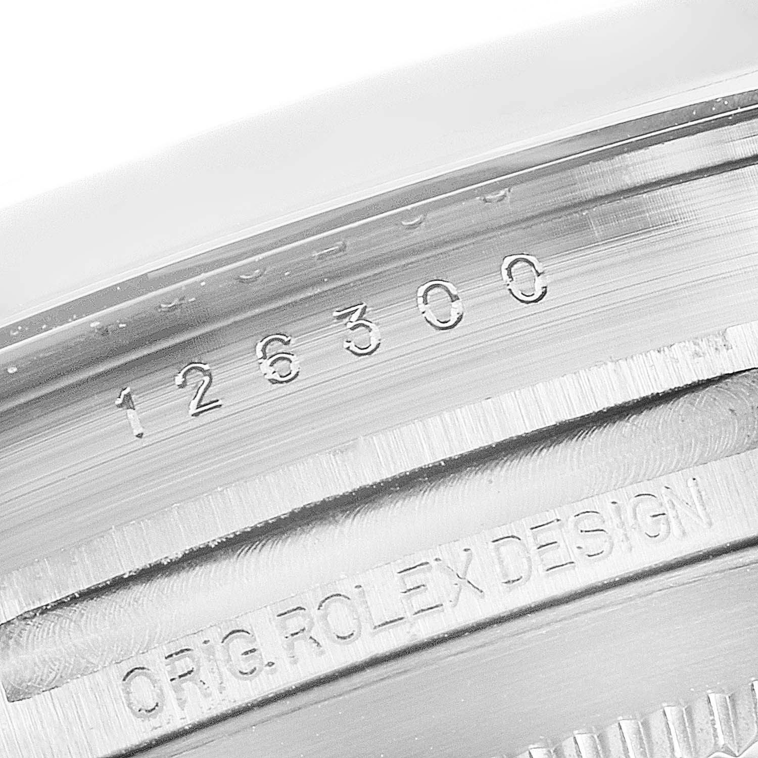 The image shows a close-up of the inside case and model number engraving on a Rolex Datejust 41 126300 Men
s Stainless Steel Blue Dial 126300 Men
s Stainless Steel Blue Dial watch.