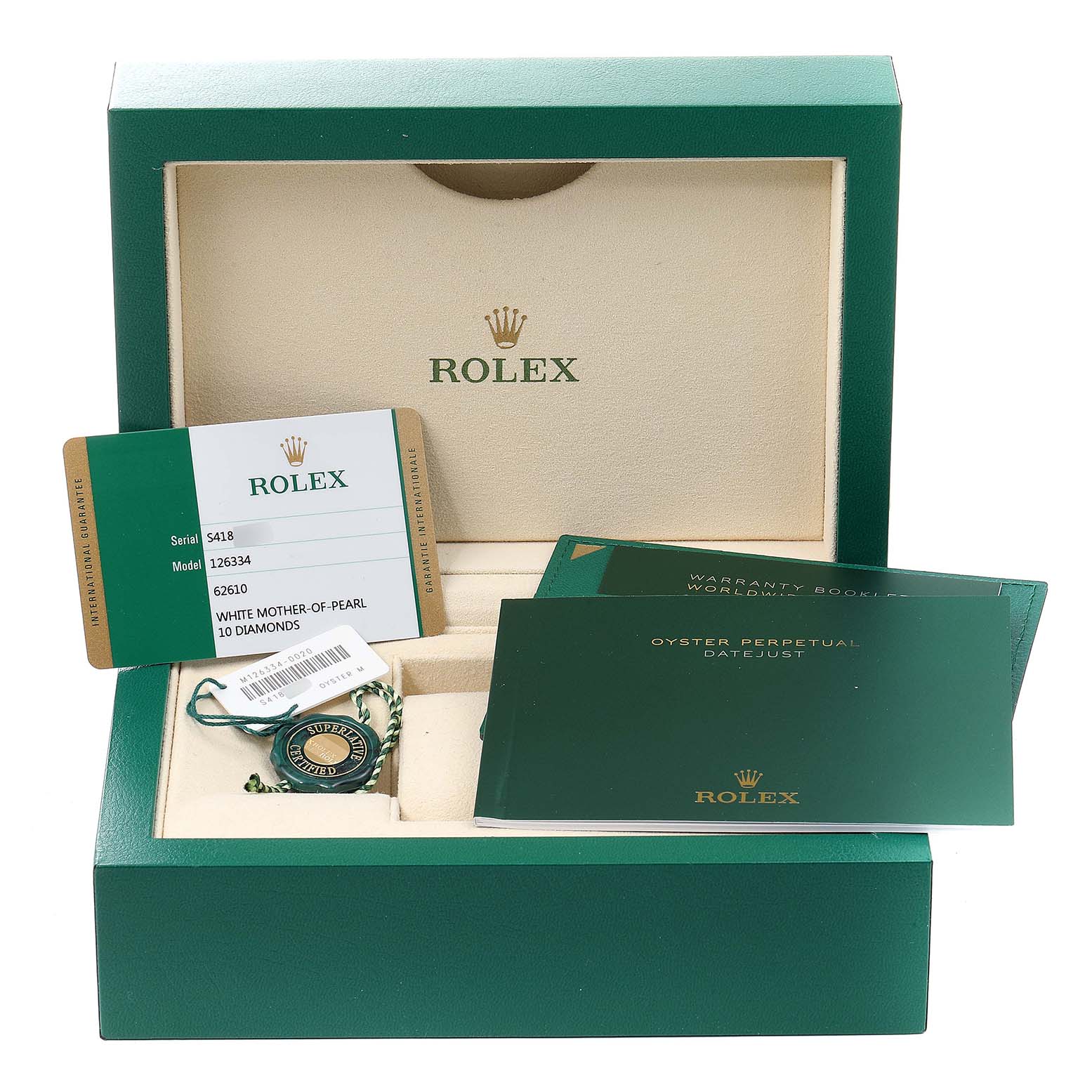 This image shows the packaging and accessories of a Rolex Datejust 41 126334 Men's Stainless Steel Mother of Pearl Dial 126334 Men's Stainless Steel Mother of Pearl Dial, including warranty cards and booklets.