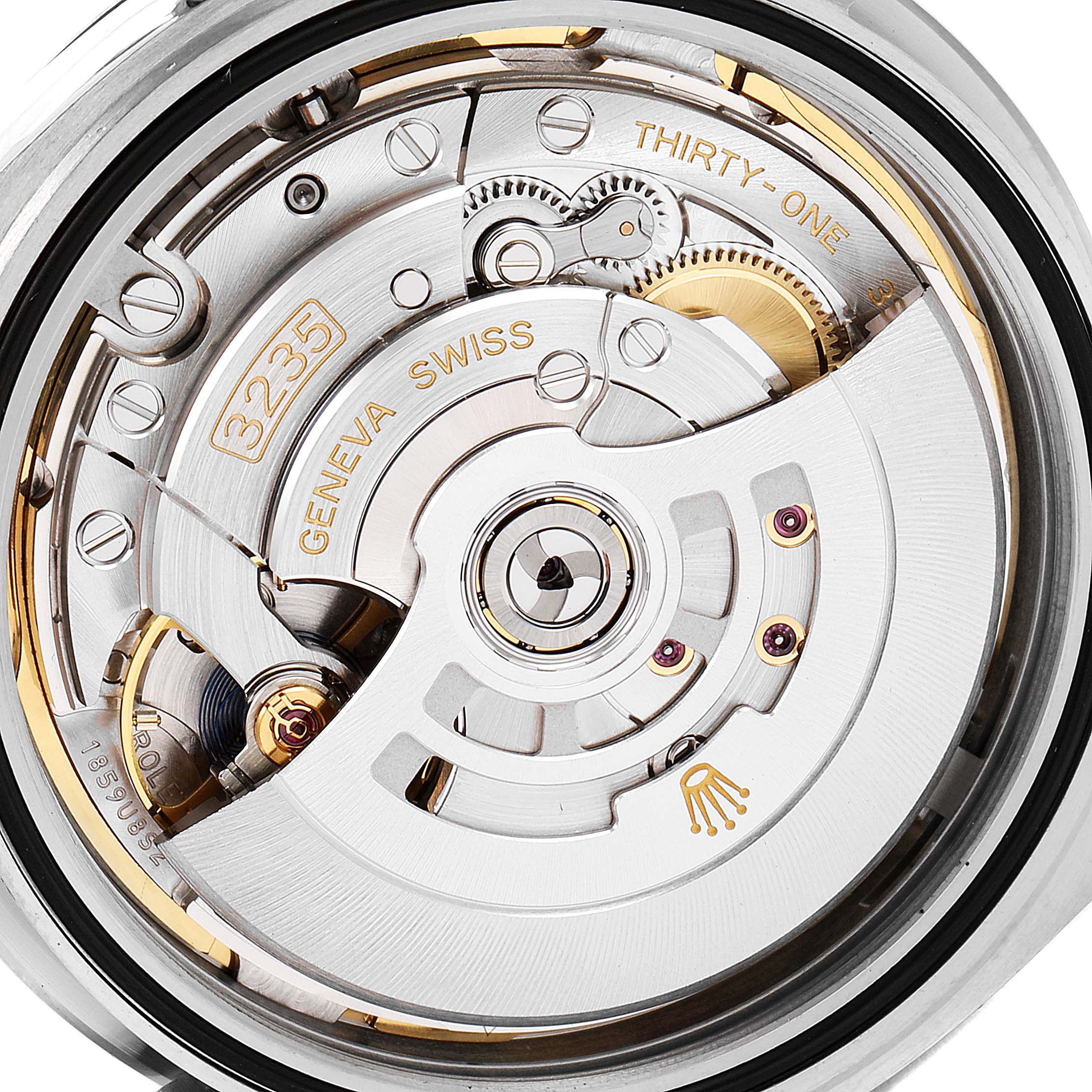 The image shows the movement mechanism of a Rolex Datejust 41 126334 Men's Stainless Steel Mother of Pearl Dial 126334 Men's Stainless Steel Mother of Pearl Dial watch, focusing on the intricate internal components.