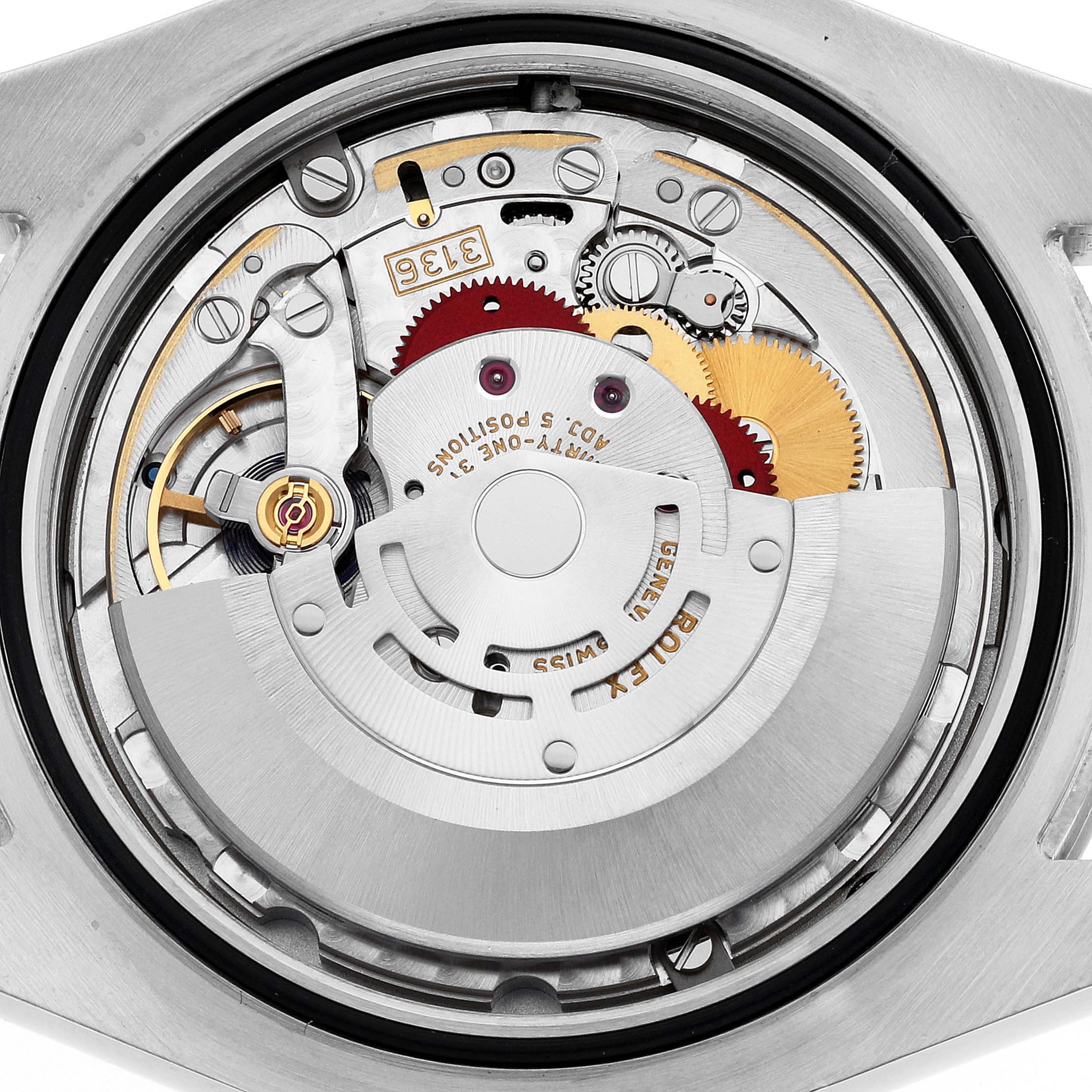 The image shows the Rolex Datejust 41 116300 Men
s Stainless Steel Black Dial 116300 Men
s Stainless Steel Black Dial model
s open case back, revealing the intricate movement and internal mechanisms.