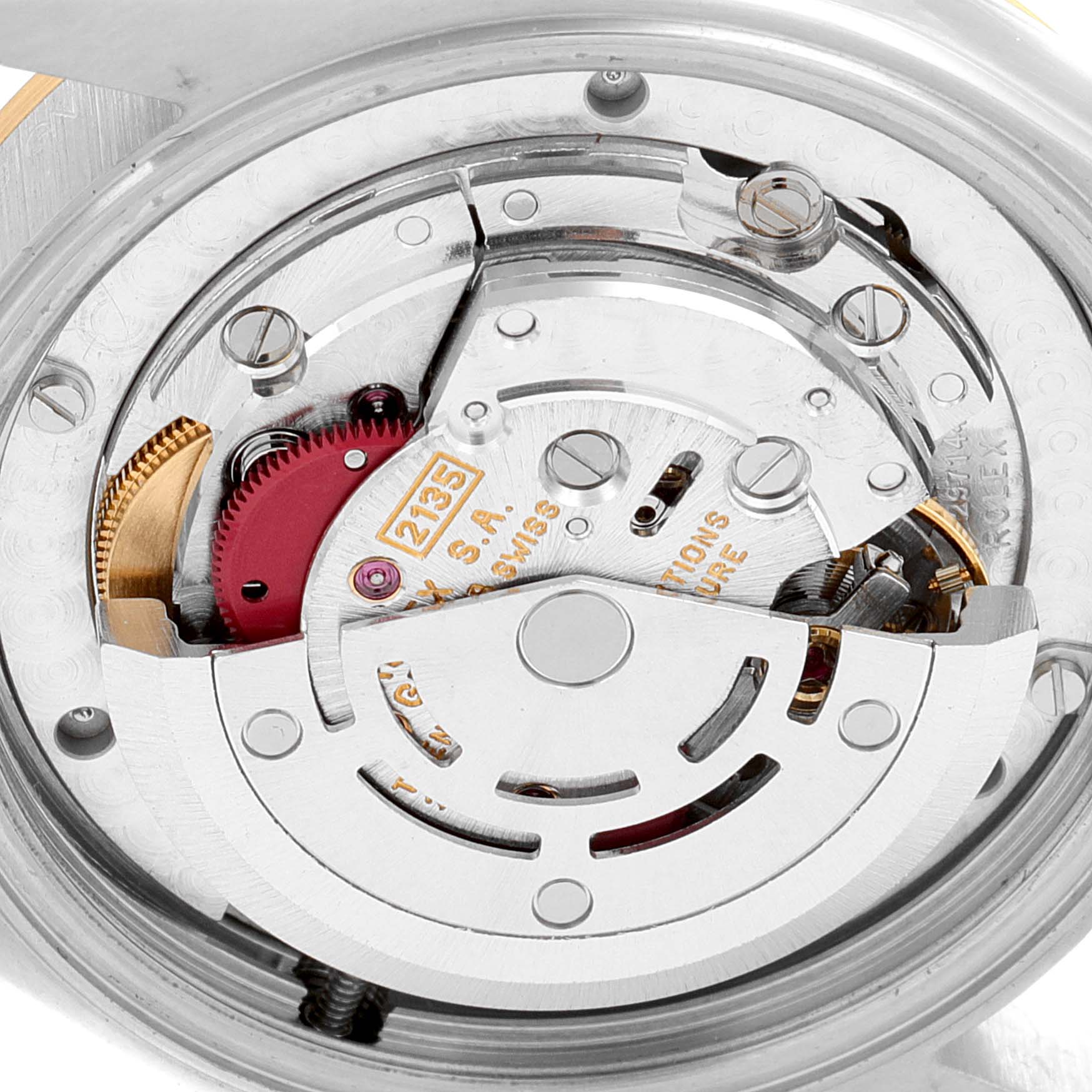 This image shows the internal mechanism of a Mid-Size Rolex watch, highlighting its intricate movement parts.