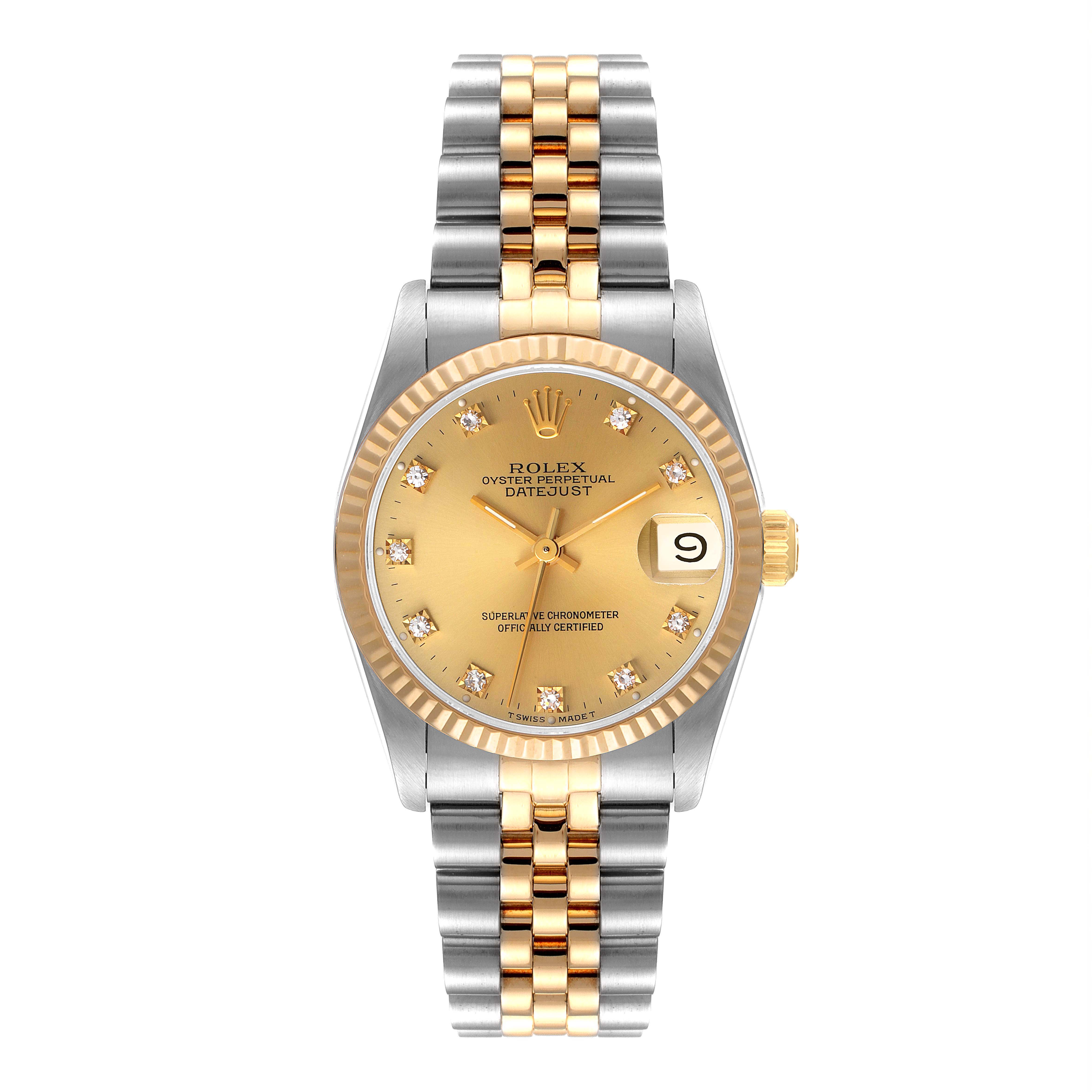 The image shows a front view of a Rolex Mid-Size 68273 Women
s Steel and Gold (two tone) Champagne Dial 68273 Women
s Steel and Gold (two tone) Champagne Dial Datejust watch with a two-tone bracelet and a gold dial.