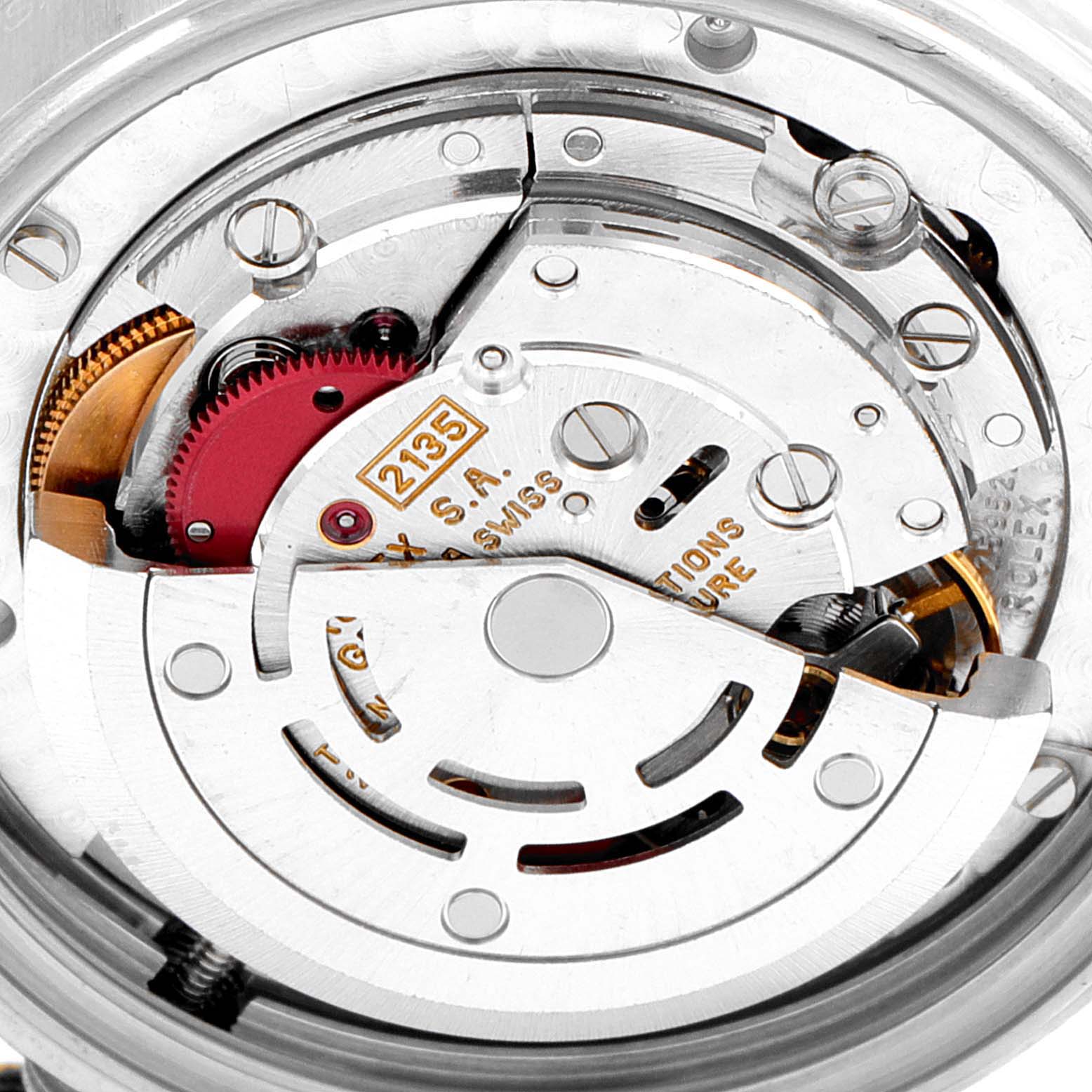 The image shows the internal mechanism of a Rolex Mid-Size 68273 Women
s Steel and Gold (two tone) Champagne Dial 68273 Women
s Steel and Gold (two tone) Champagne Dial model watch, including gears and the movement labeled "2135."