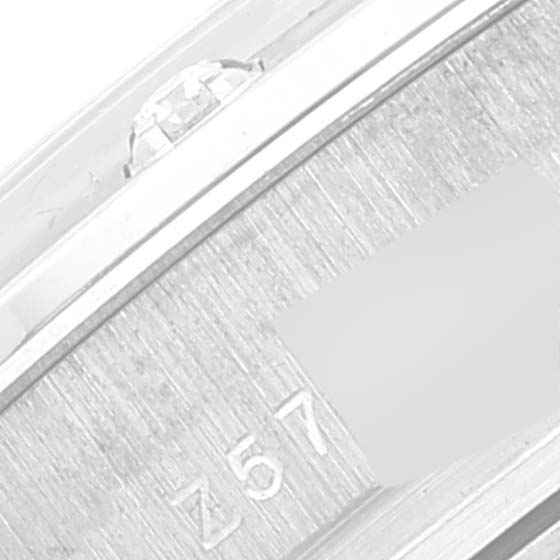 The image shows a close-up of the bezel and part of the bracelet of a Rolex Pearlmaster 80319 Women's White Gold Silver Dial 80319 Women's White Gold Silver Dial watch.