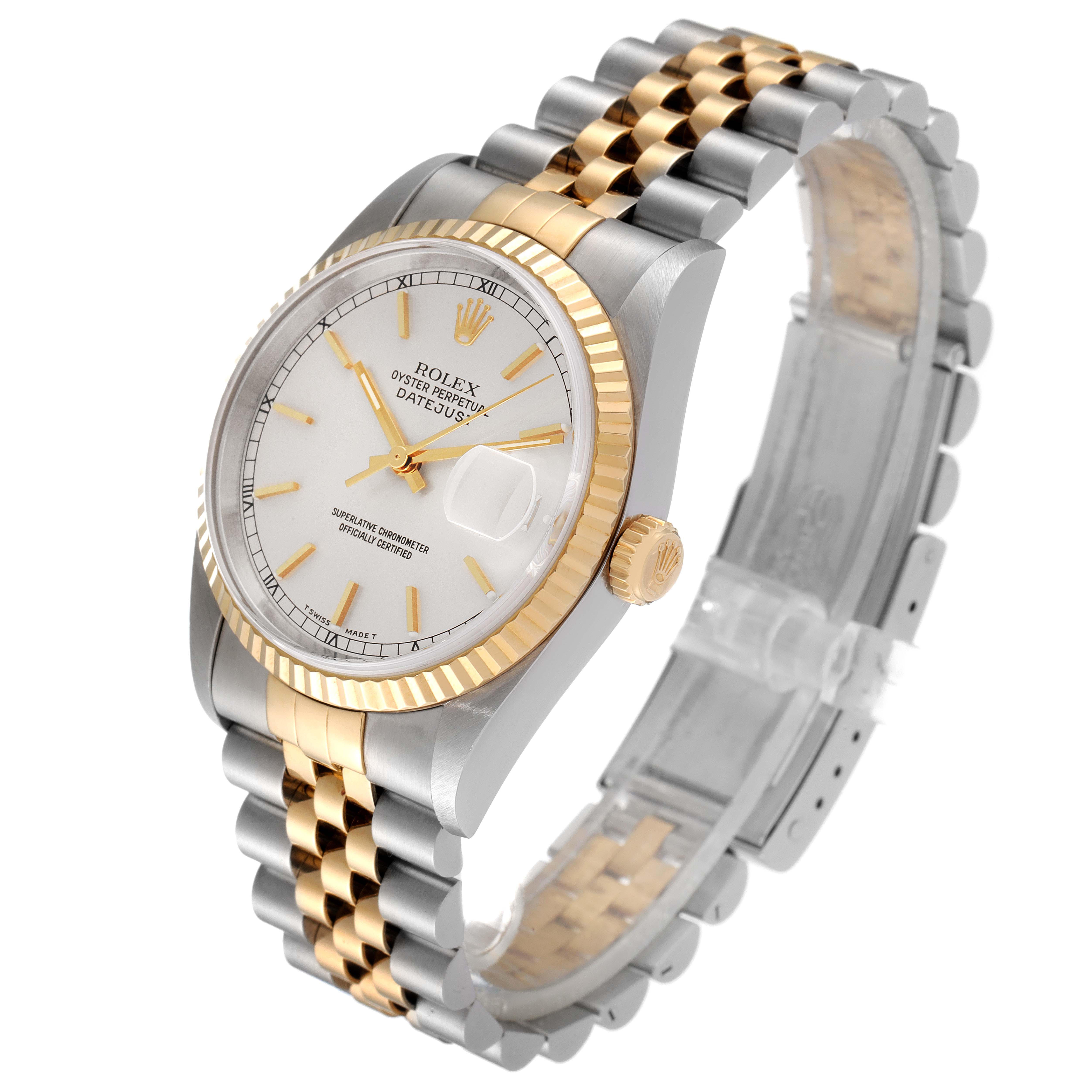 The Rolex Datejust 16233 Men's Steel and Gold (two tone) Silver Dial 16233 Men's Steel and Gold (two tone) Silver Dial watch is displayed at a three-quarter angle, showcasing its face, fluted bezel, two-tone bracelet, and crown.