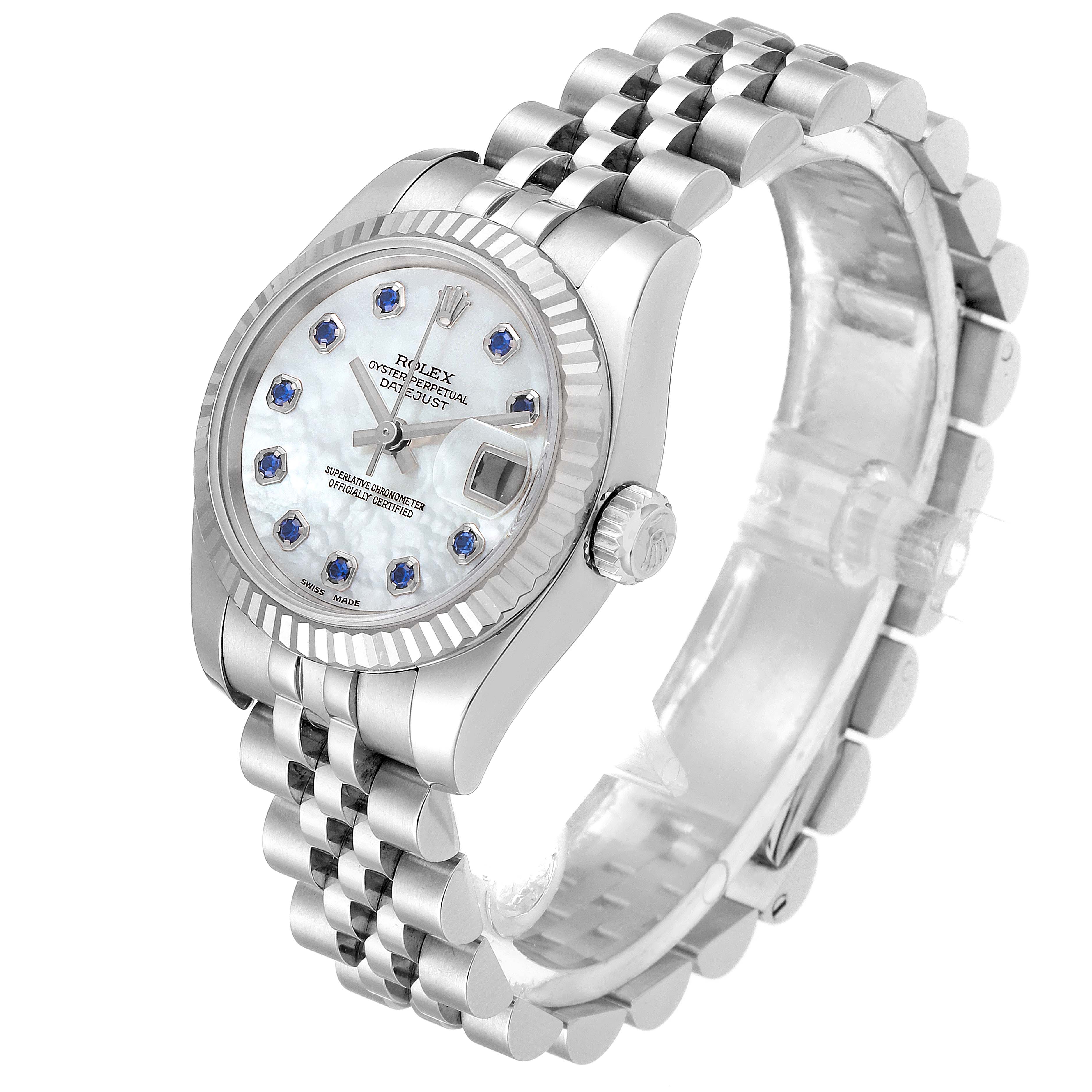 The Rolex Datejust 179174 Women's Stainless Steel Mother of Pearl Dial 179174 Women's Stainless Steel Mother of Pearl Dial watch is shown at a three-quarter angle, highlighting its face, bezel, crown, and Jubilee bracelet.