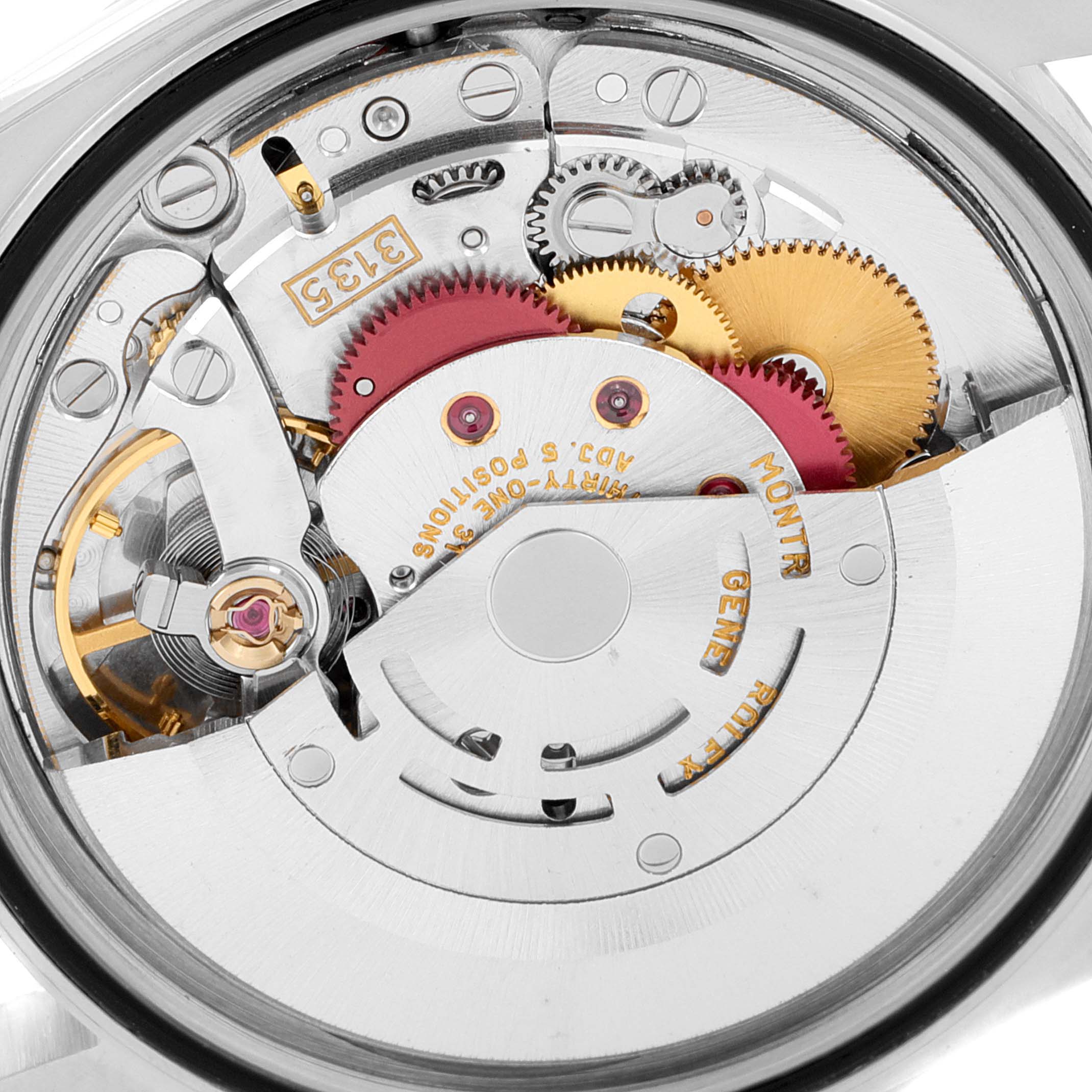 This image shows the intricate internal mechanics and movement of a Rolex Datejust 16234 Men's Stainless Steel Grey Dial 16234 Men's Stainless Steel Grey Dial watch from a close-up angle.