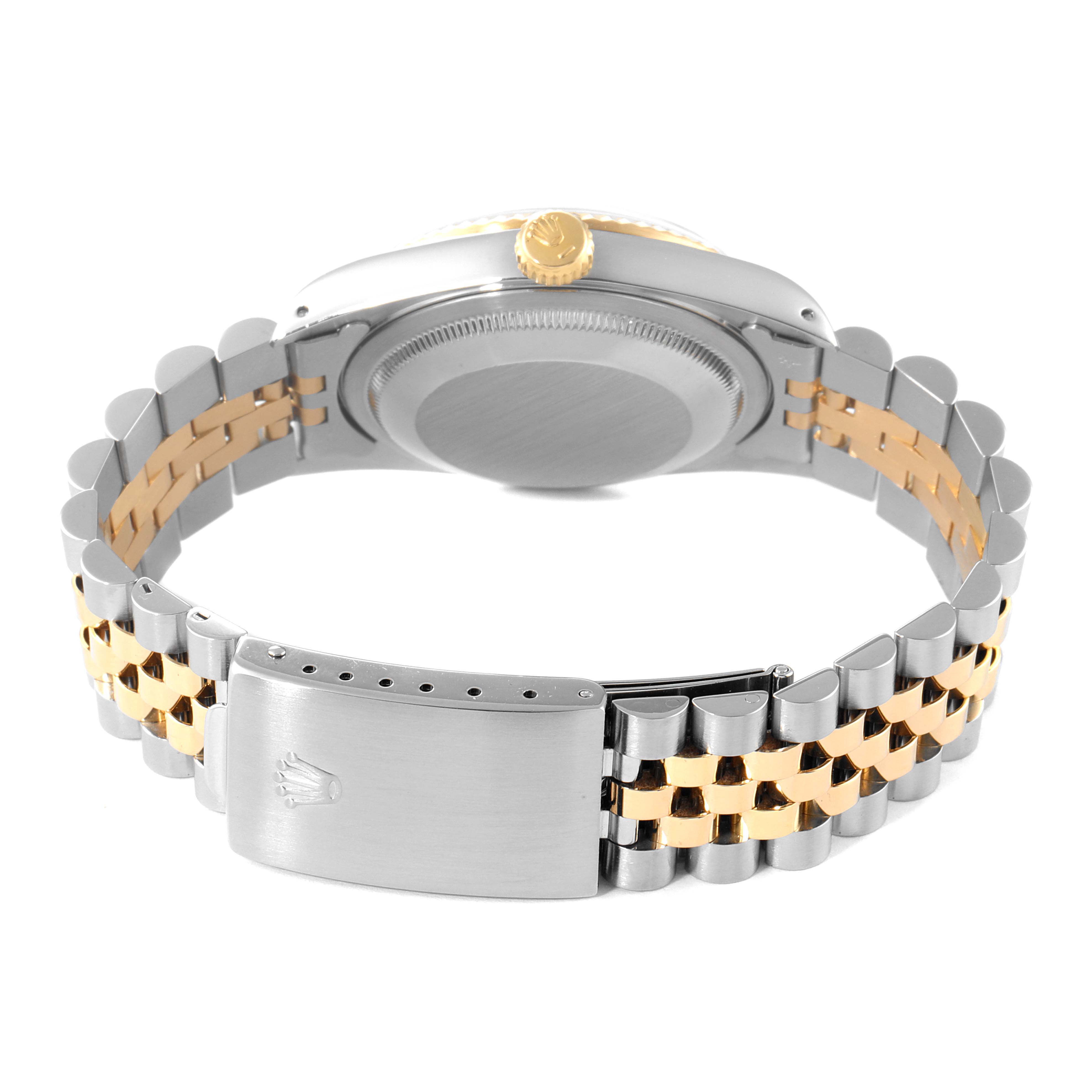 This image shows the back and bracelet of a Rolex Datejust 16233 Men's Steel and Gold (two tone) Champagne Dial 16233 Men's Steel and Gold (two tone) Champagne Dial watch at an angled view.
