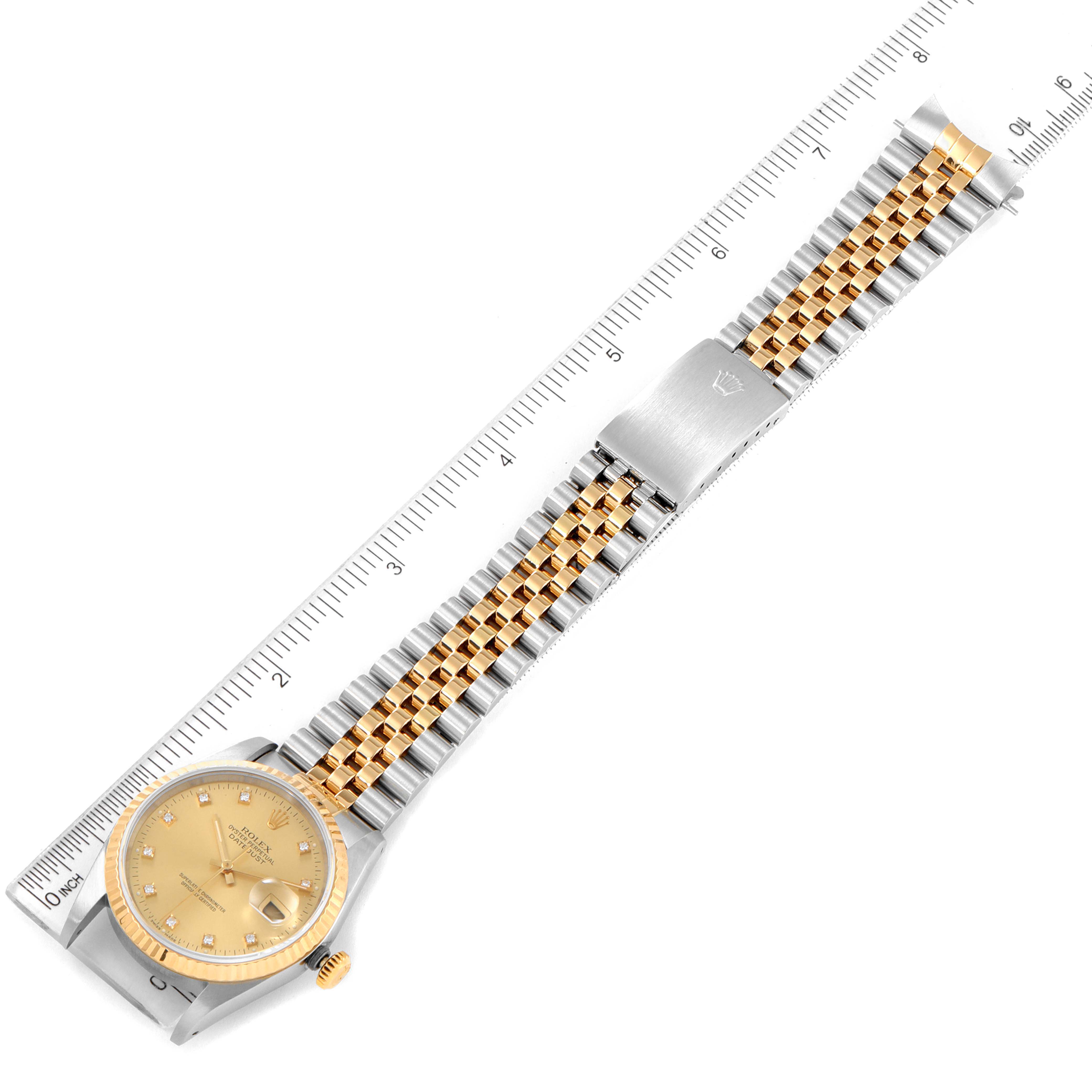 This image shows a top view of a Rolex Datejust 16233 Men's Steel and Gold (two tone) Champagne Dial 16233 Men's Steel and Gold (two tone) Champagne Dial watch, focusing on the face, bezel, and two-tone bracelet with a clasp.