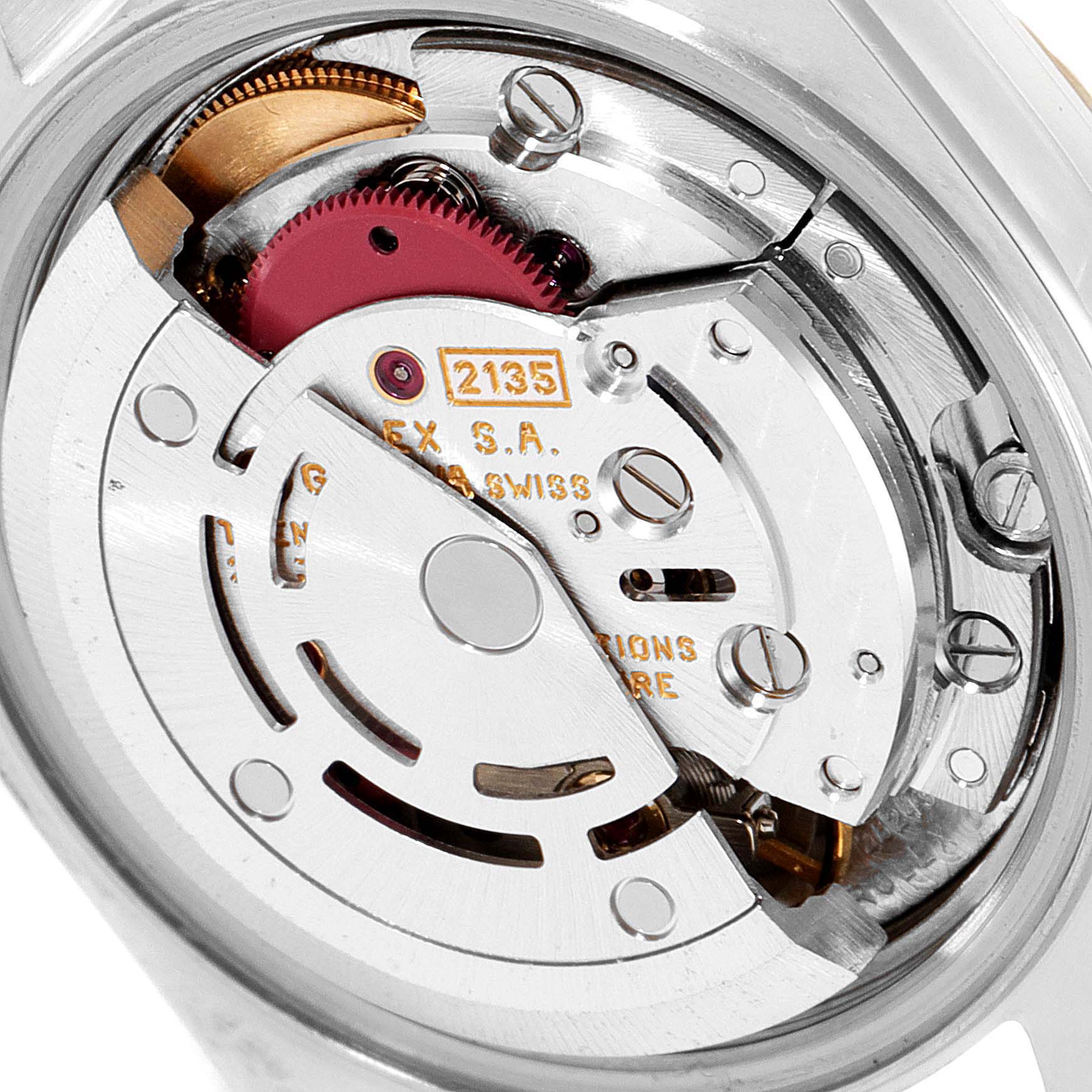 This image shows a close-up view of the internal movement mechanism of a Rolex Datejust 69173 Women's Steel and Gold (two tone) White Dial 69173 Women's Steel and Gold (two tone) White Dial watch.