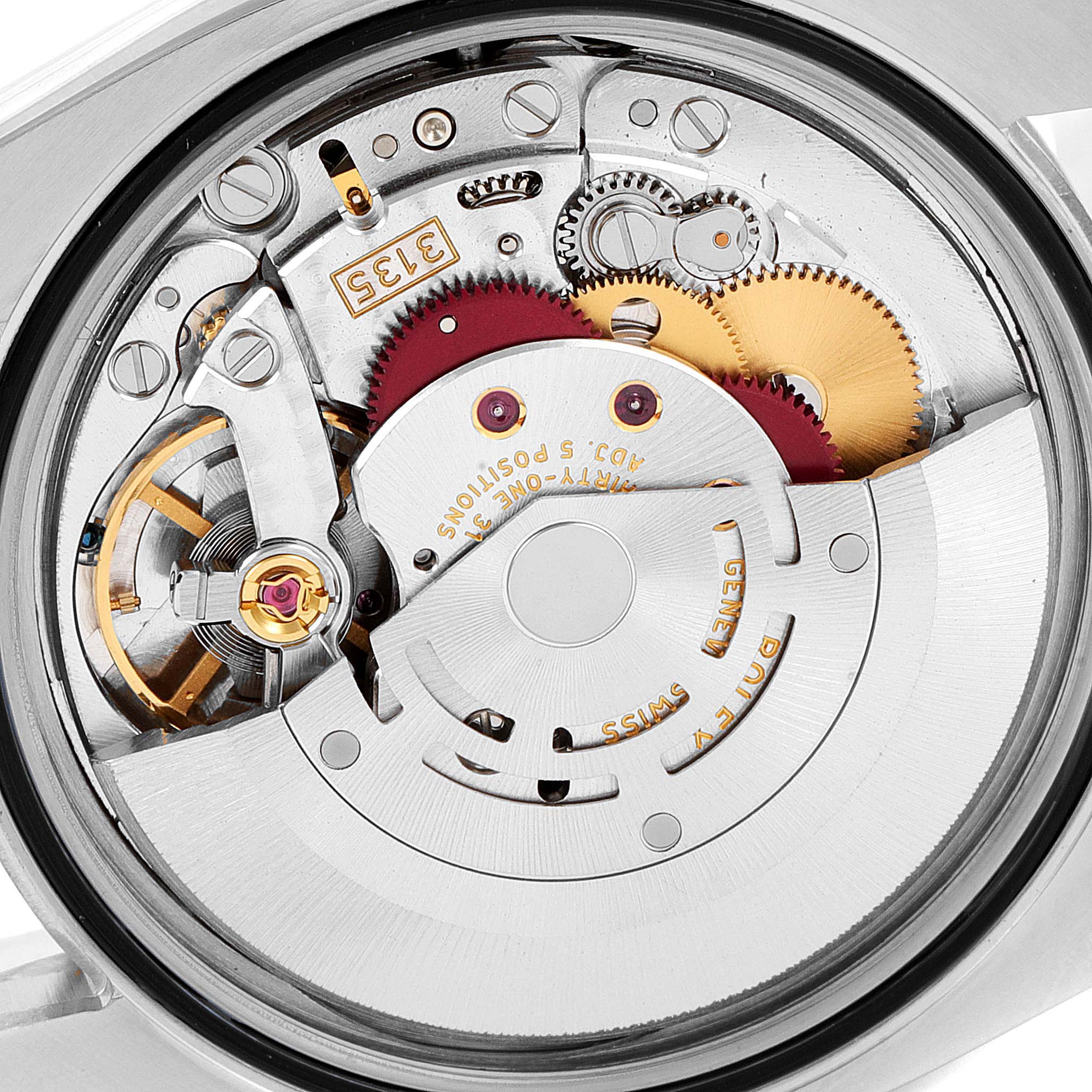 This image shows the internal mechanism of a Rolex Datejust 116233 Men's Steel and Gold (two tone) Silver Dial 116233 Men's Steel and Gold (two tone) Silver Dial model from the back angle.