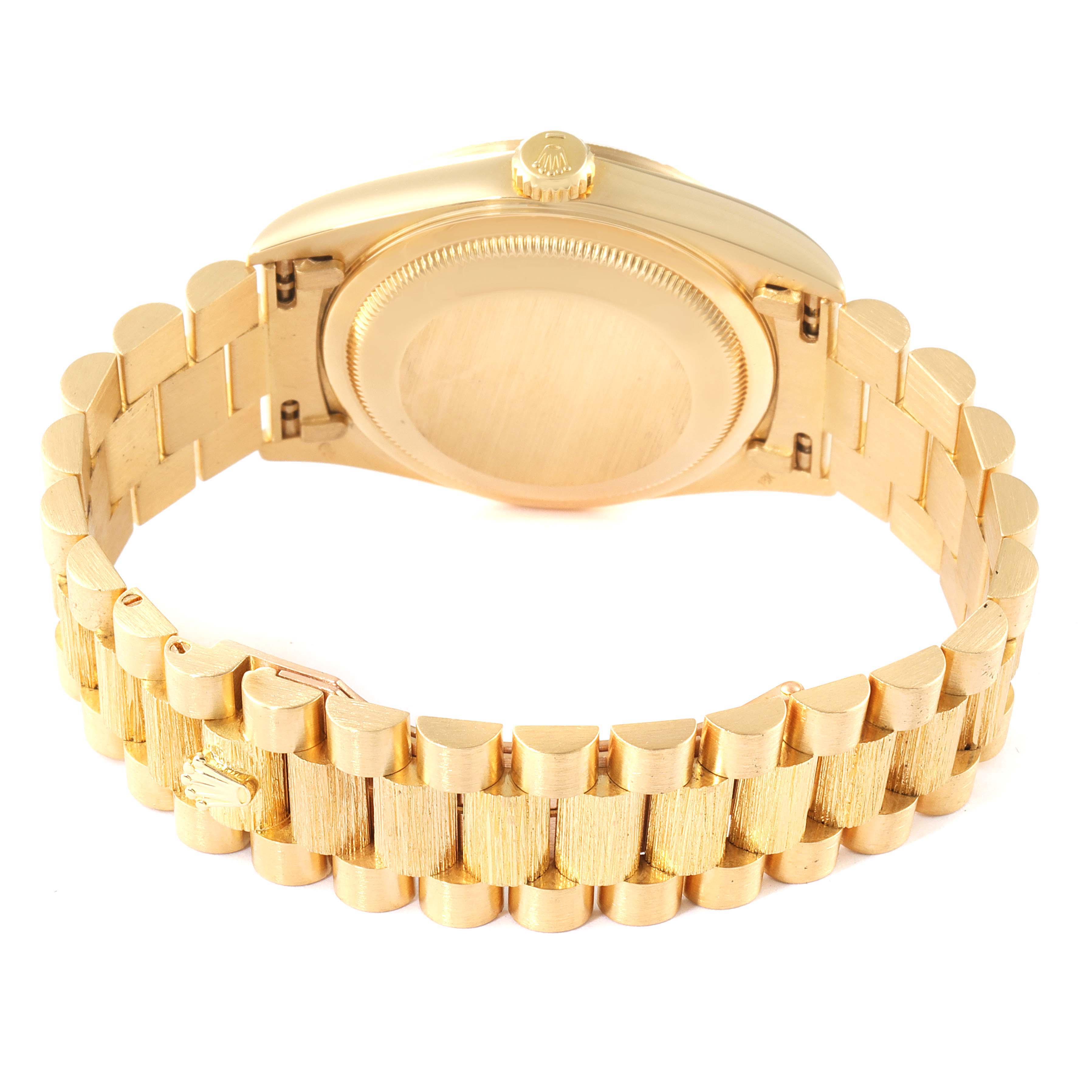 This image shows the backside and clasp of a Rolex President 18248 Men's Yellow Gold Champagne Dial 18248 Men's Yellow Gold Champagne Dial model watch, highlighting the gold bracelet and case back.