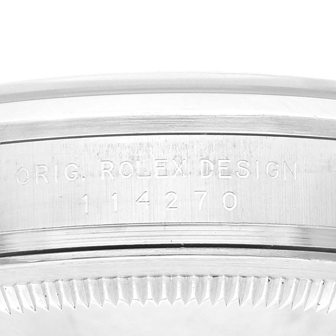This close-up image shows the side engraving of a Rolex Explorer 114270 Men's Stainless Steel Black Dial 114270 Men's Stainless Steel Black Dial watch, highlighting "ORIG. ROLEX DESIGN 114270."