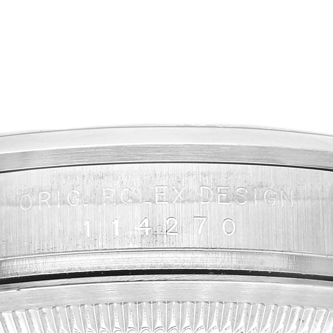 Close-up of the side of a Rolex Explorer 114270 Men's Stainless Steel Black Dial 114270 Men's Stainless Steel Black Dial watch, showing the engraved serial number and design details.