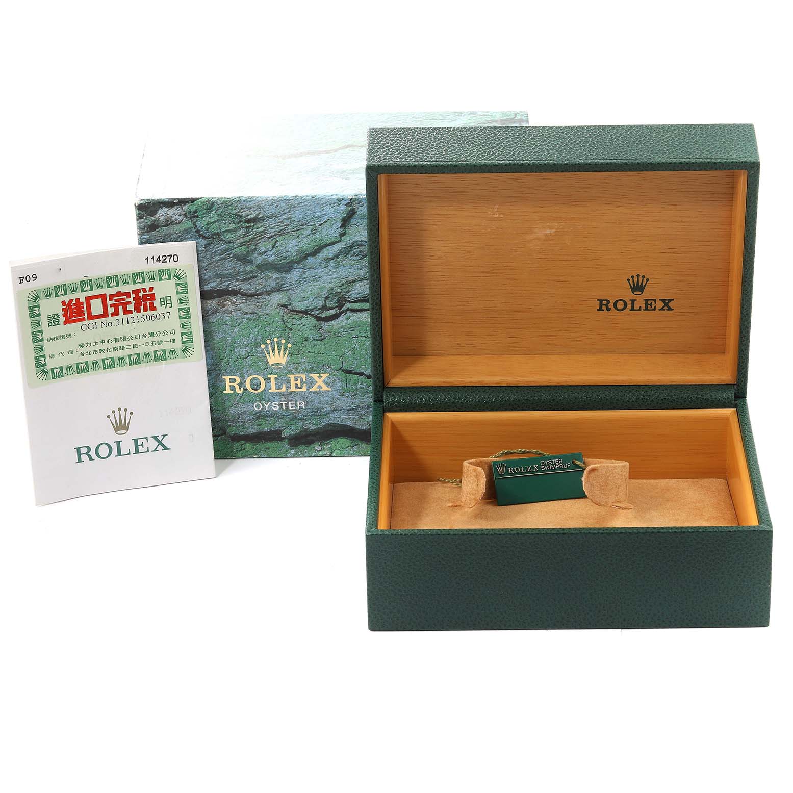 The image shows the open box and certification cards for a Rolex Explorer 114270 Men
s Stainless Steel Black Dial 114270 Men
s Stainless Steel Black Dial watch.