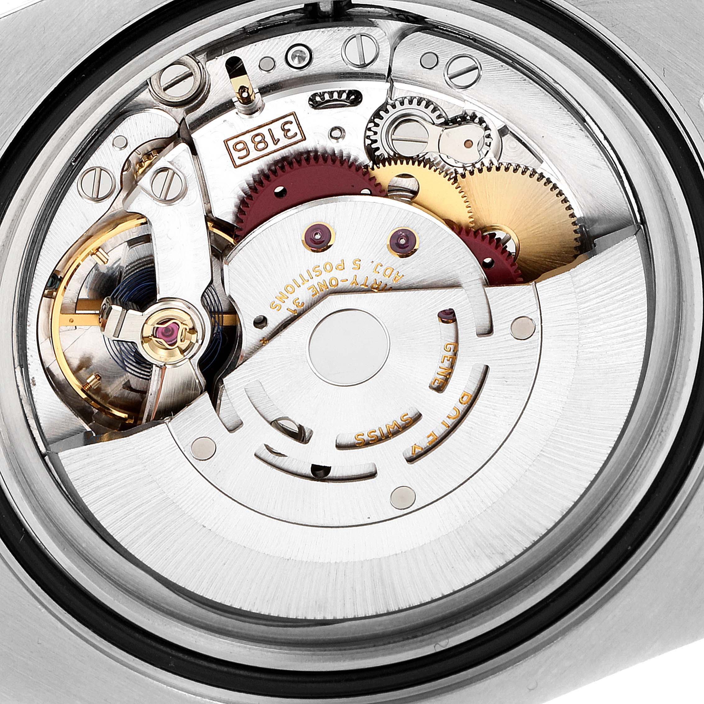 The image shows a close-up view of the intricate inner movement of a Rolex GMT-Master 116710 Men
s Stainless Steel Black Dial 116710 Men
s Stainless Steel Black Dial watch.