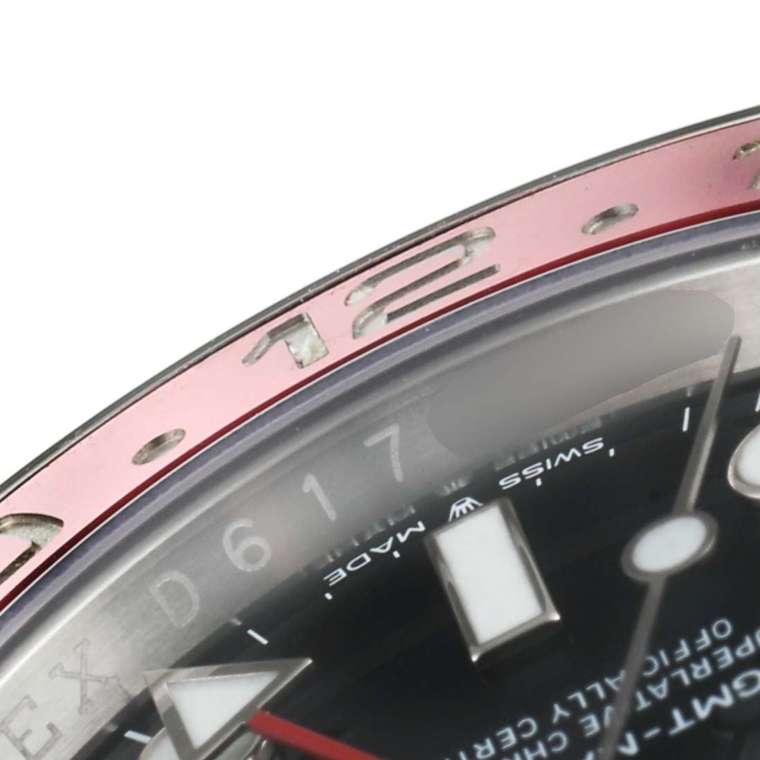 The image shows an angled close-up of the bezel, part of the dial, and hour markers of the Rolex GMT-Master 126710 Men's Stainless Steel Black Dial 126710 Men's Stainless Steel Black Dial watch.