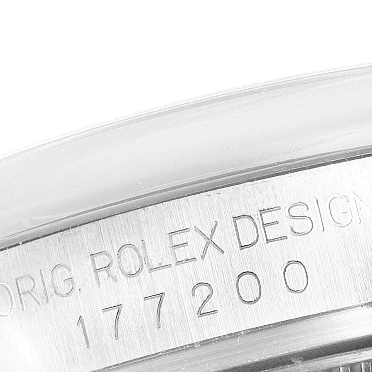 The image shows a close-up of the case back edge of a Mid-Size Rolex watch with the model number 177200 engraved.