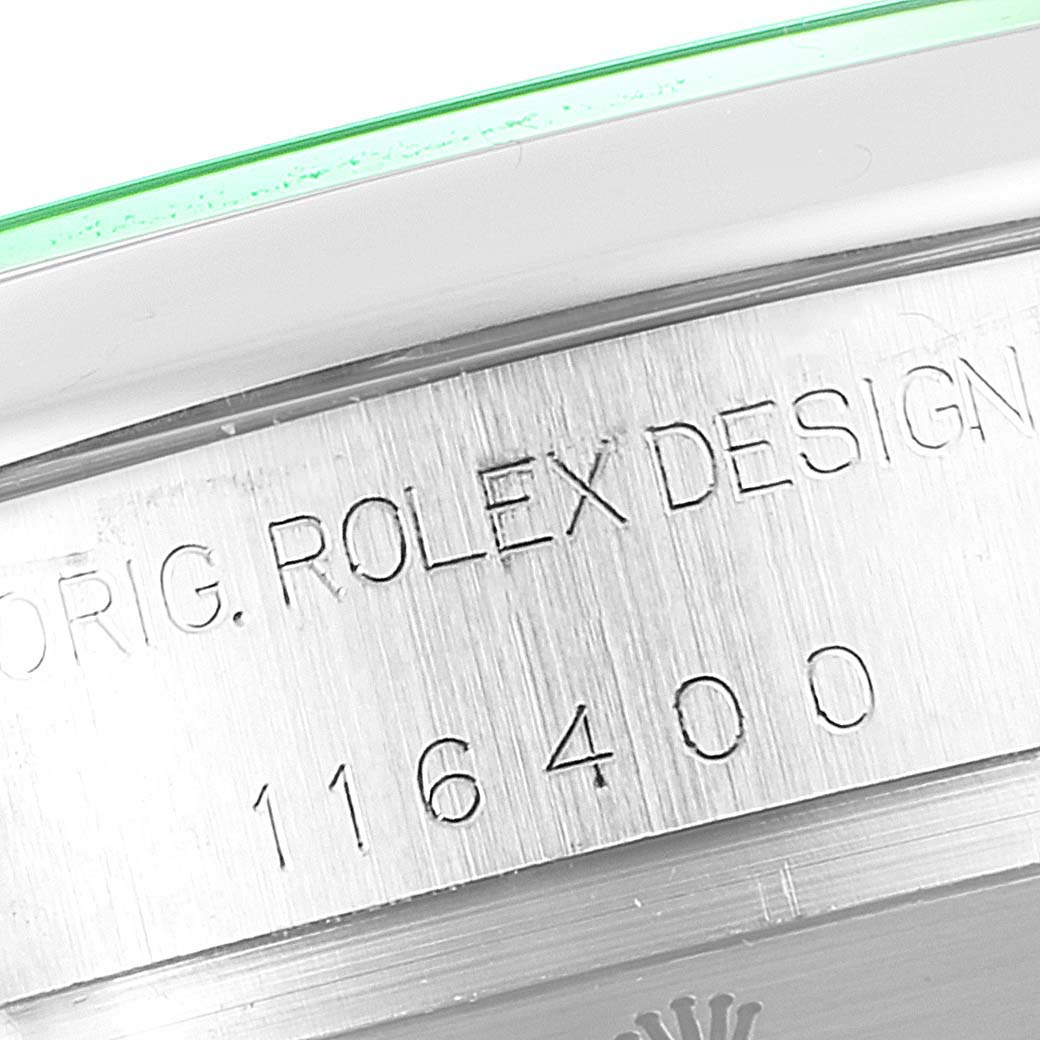 This image shows the engraved reference number and "ROLEX DESIGN" markings on the side of the Milgauss model by Rolex.