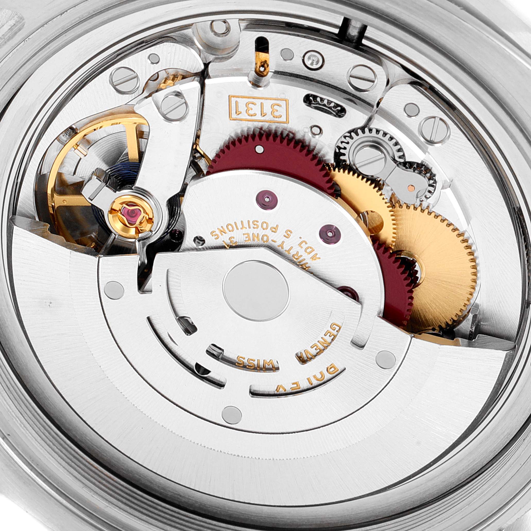 This image shows a close-up of the movement of a Rolex Milgauss 116400GV Men's Stainless Steel Blue Dial 116400GV Men's Stainless Steel Blue Dial watch, highlighting the intricate gears and components.