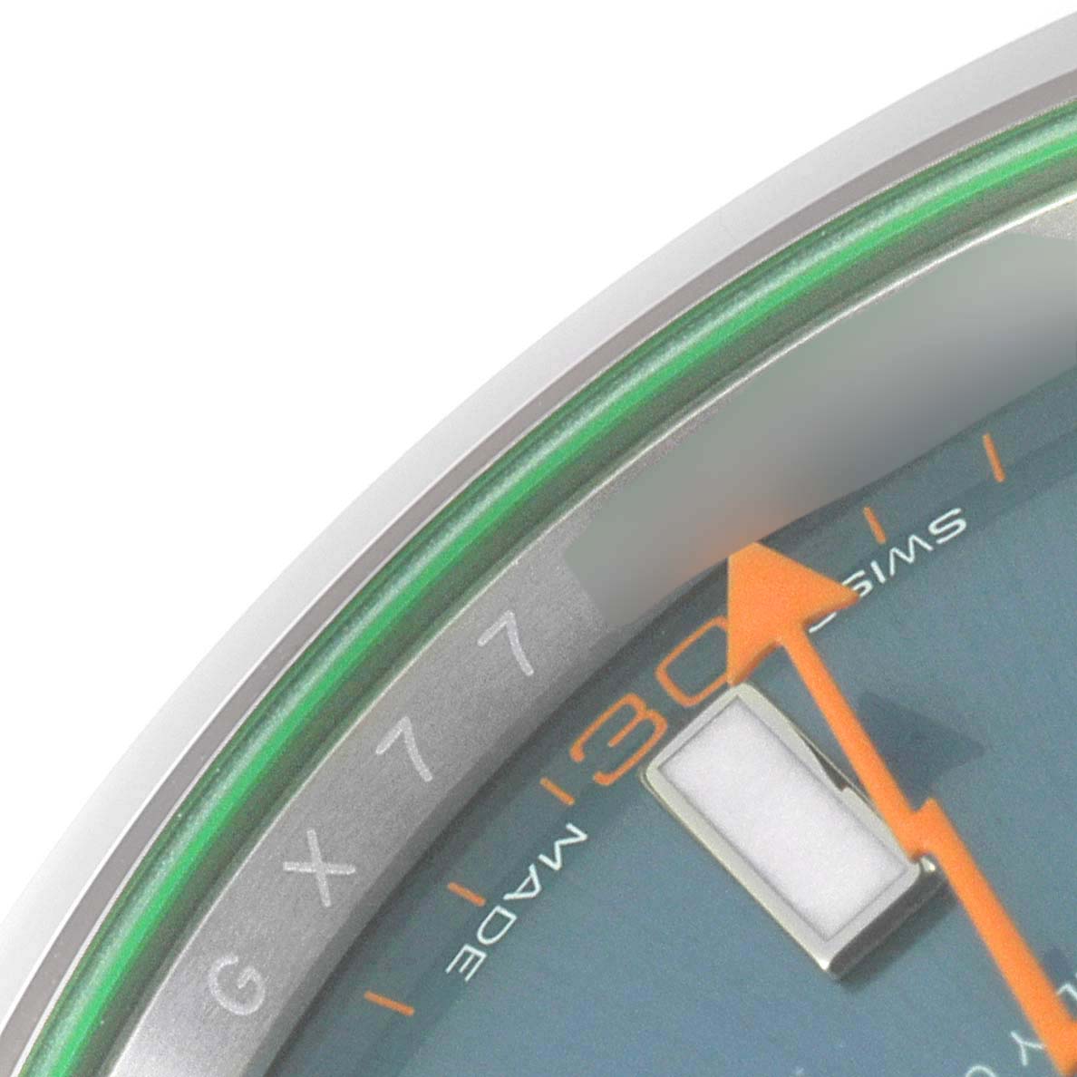This image shows a close-up of the dial and part of the bezel of a Rolex Milgauss 116400GV Men's Stainless Steel Blue Dial 116400GV Men's Stainless Steel Blue Dial watch.