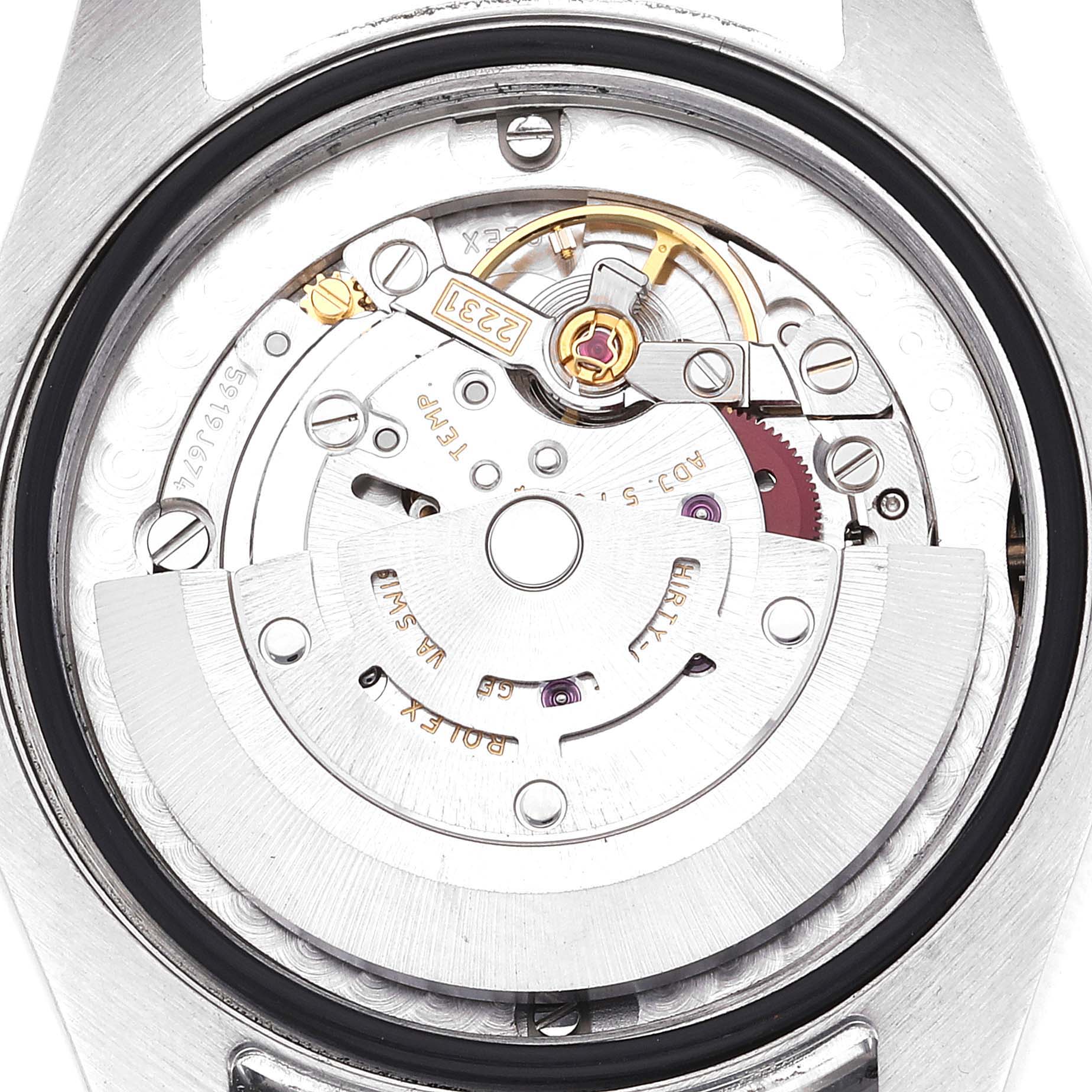 The image shows an interior view of the Rolex Mid-Size 177200 Women's Stainless Steel White Dial 177200 Women's Stainless Steel White Dial watch, focusing on the movement and mechanism components.