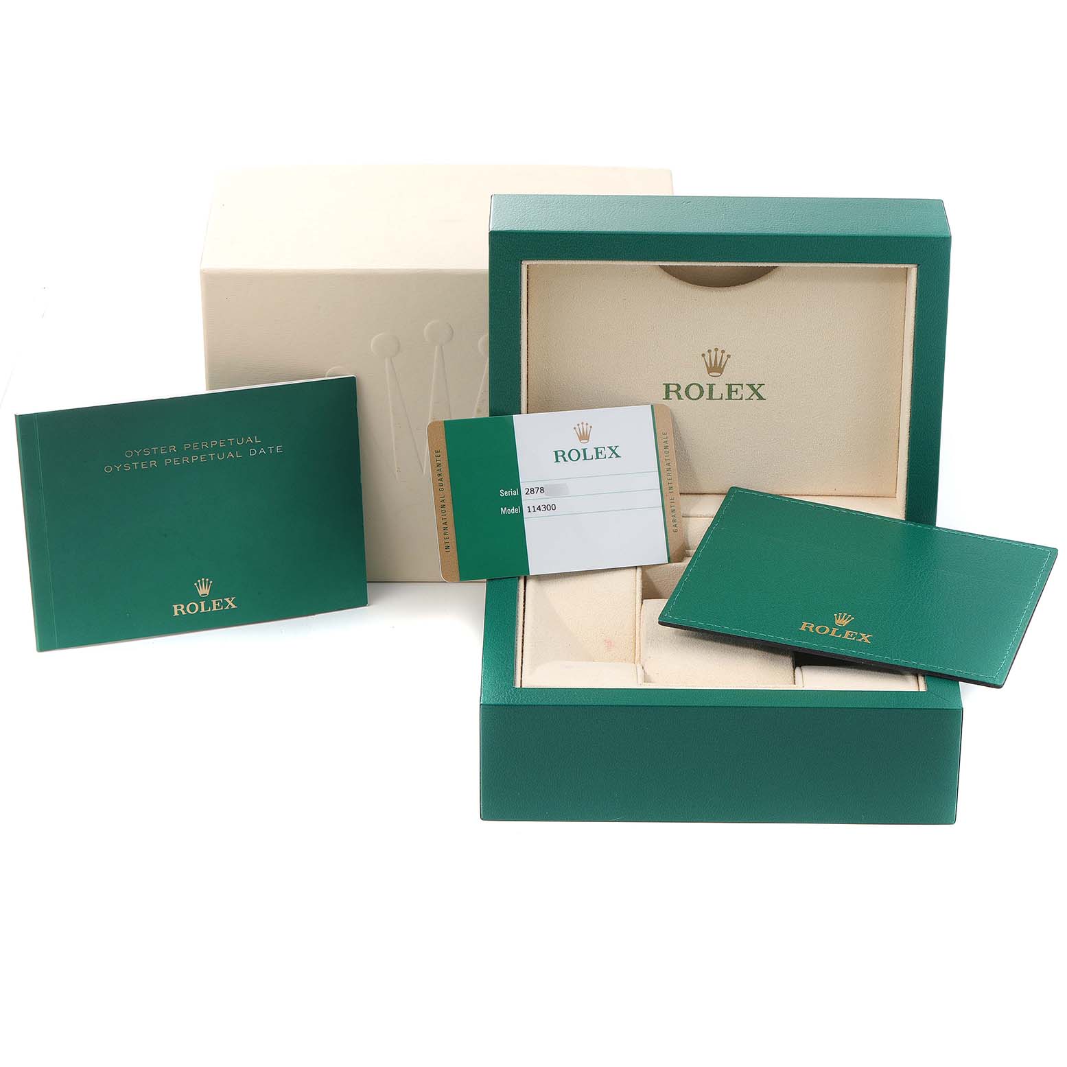 The image shows the packaging, warranty card, and booklet for a Rolex Oyster Perpetual 114300 Men's Stainless Steel Grey Dial 114300 Men's Stainless Steel Grey Dial model watch.
