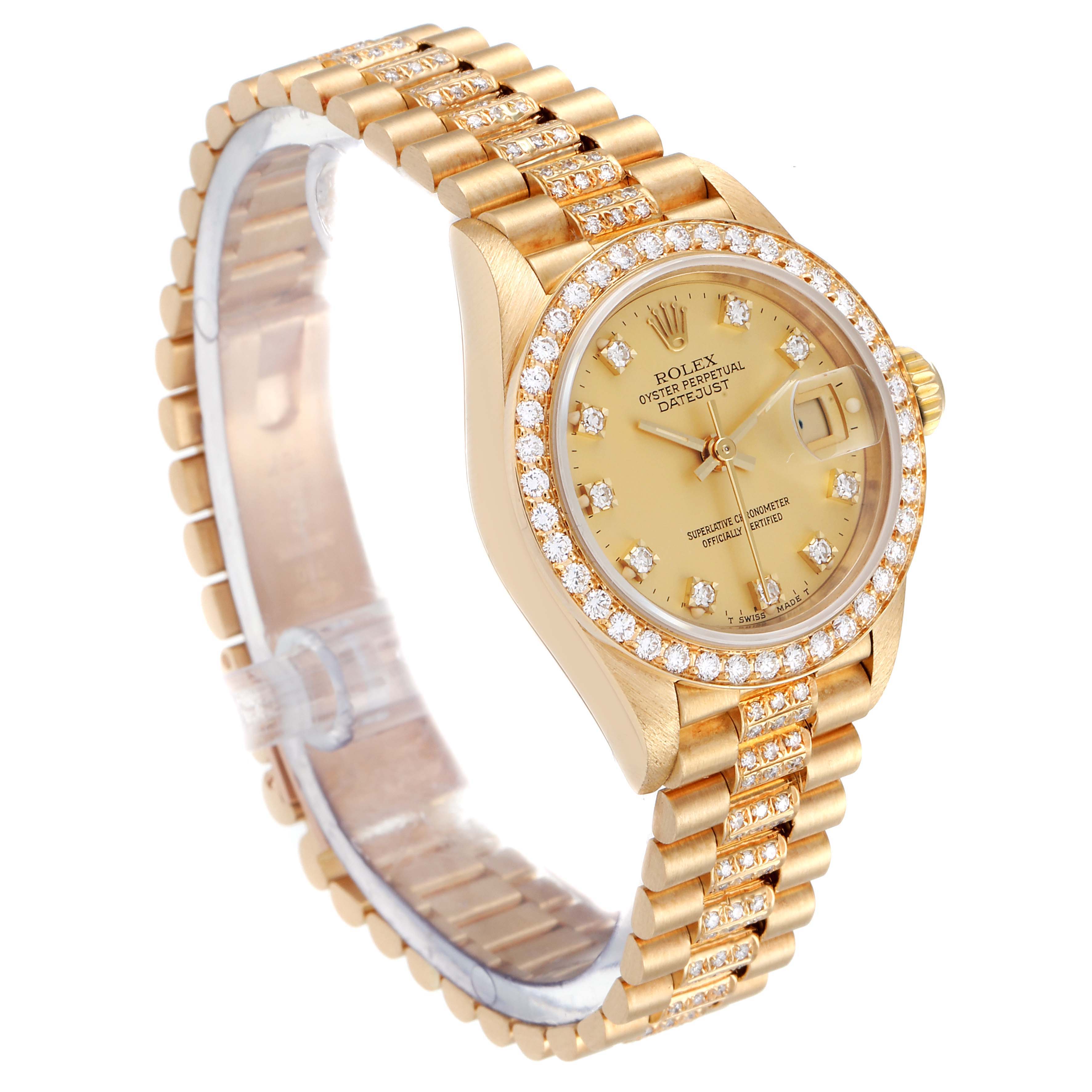 The image shows a Rolex President 69138 Women's Yellow Gold Champagne Dial 69138 Women's Yellow Gold Champagne Dial model watch, angled to display the gold bracelet, diamond-encrusted bezel, and champagne dial.