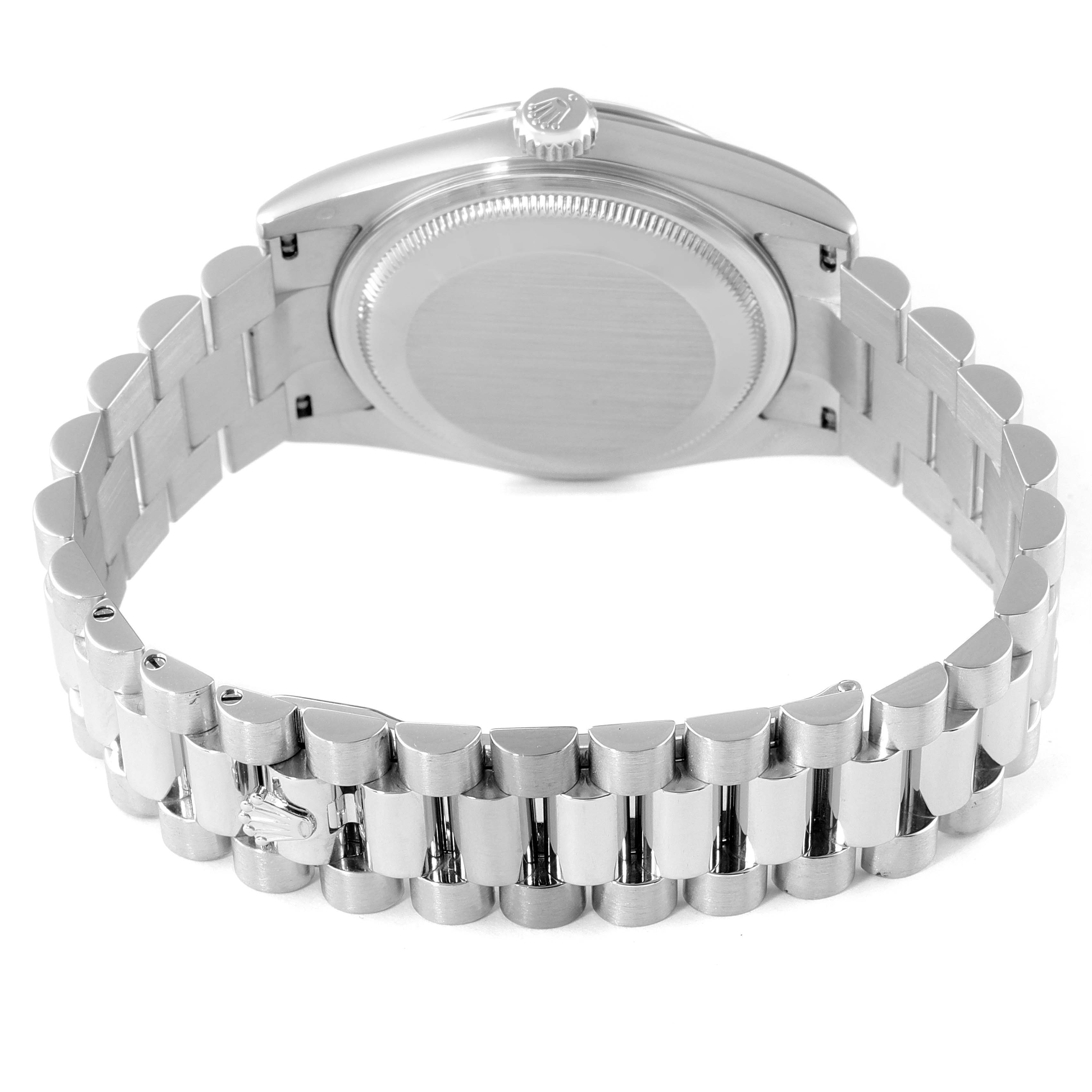 This image shows the back case and the bracelet of a Rolex President 118206 Men's Platinum Blue Dial 118206 Men's Platinum Blue Dial model watch.